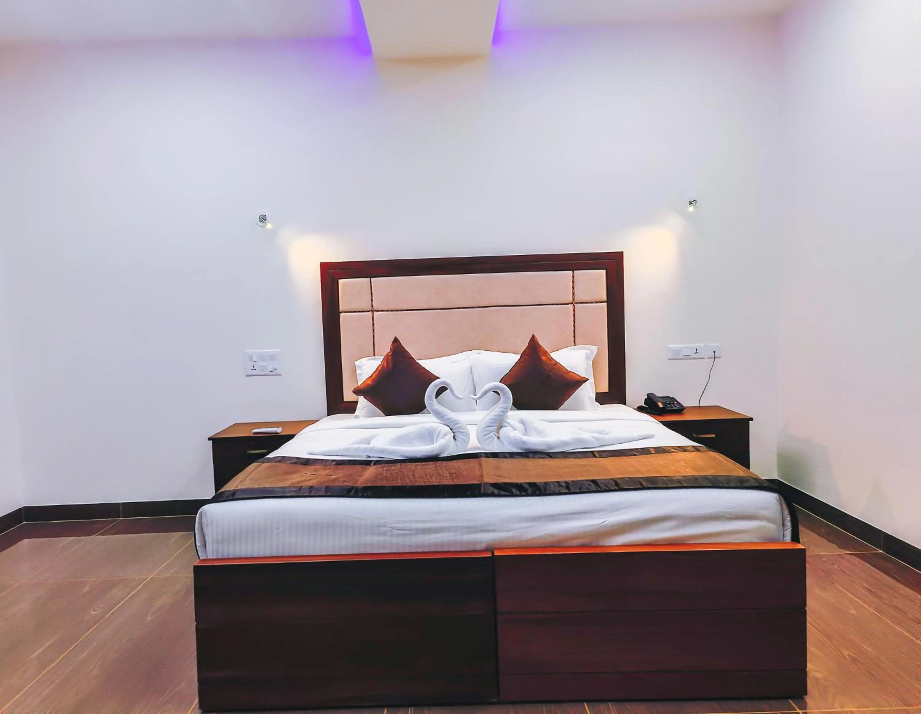 Bed in Skylar Seaview Beach Resort & Ayurveda Varkala