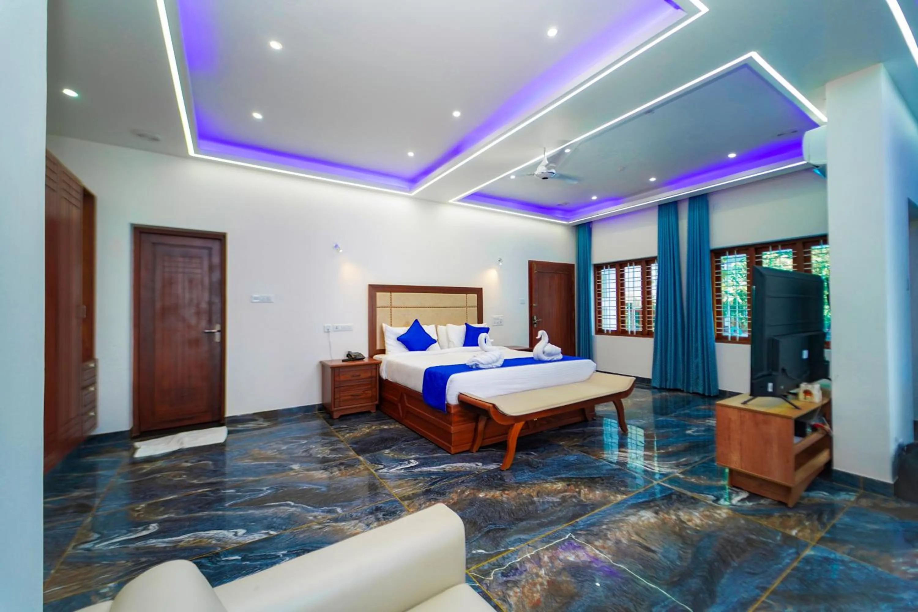 Bed in Skylar Seaview Beach Resort & Ayurveda Varkala