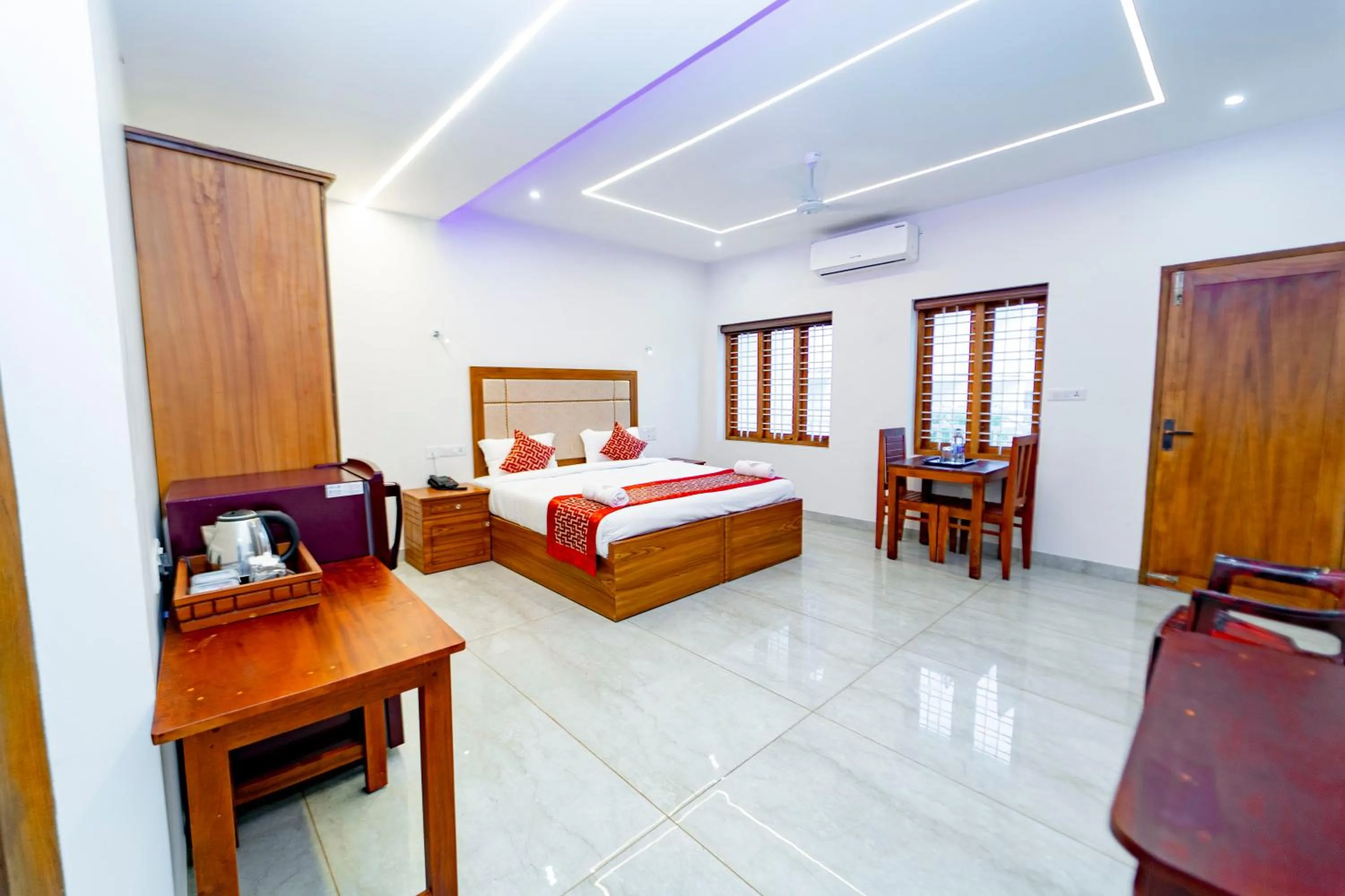 Bed in Skylar Seaview Beach Resort & Ayurveda Varkala