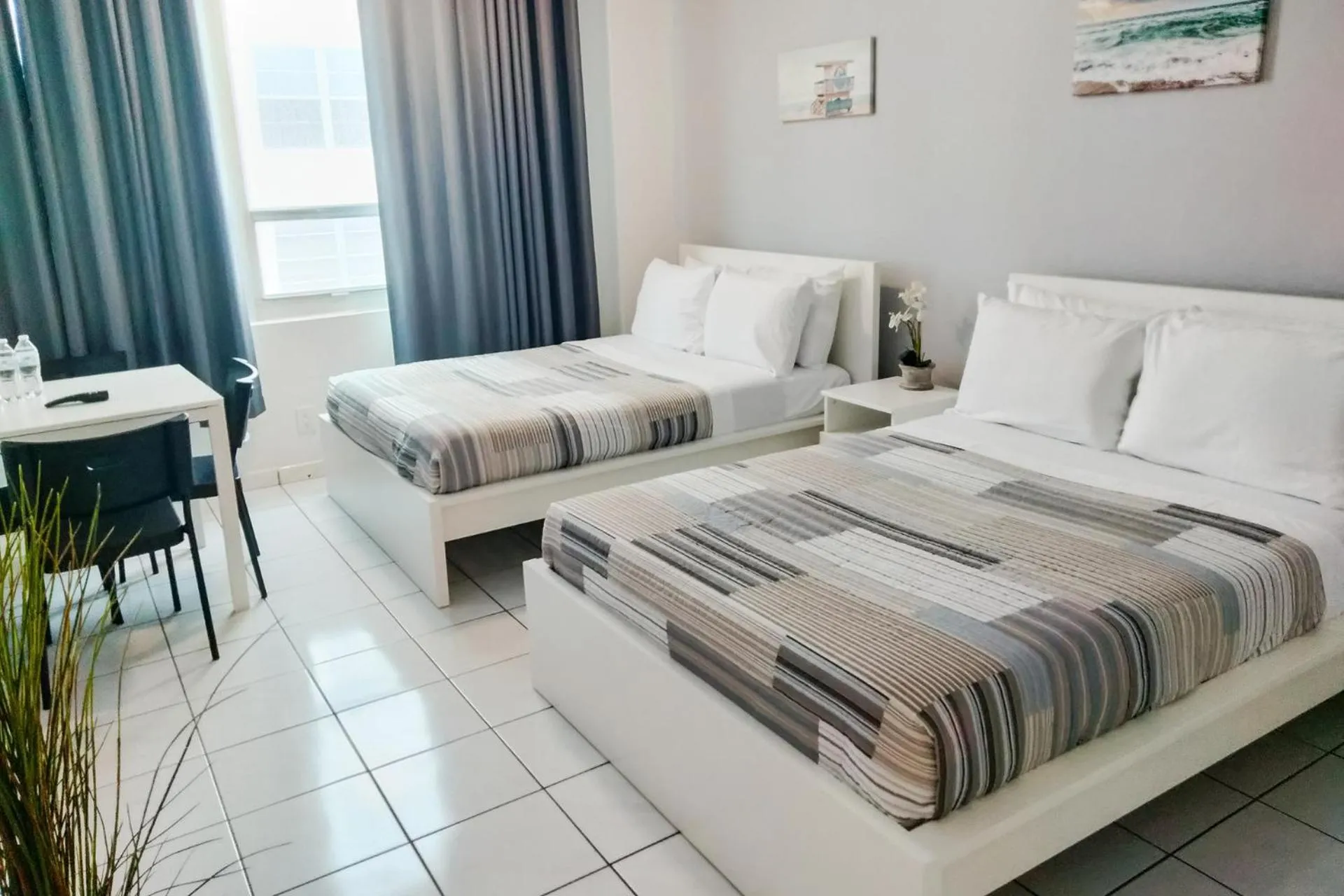 Bed in Miami Beach Apartments by MiaRentals