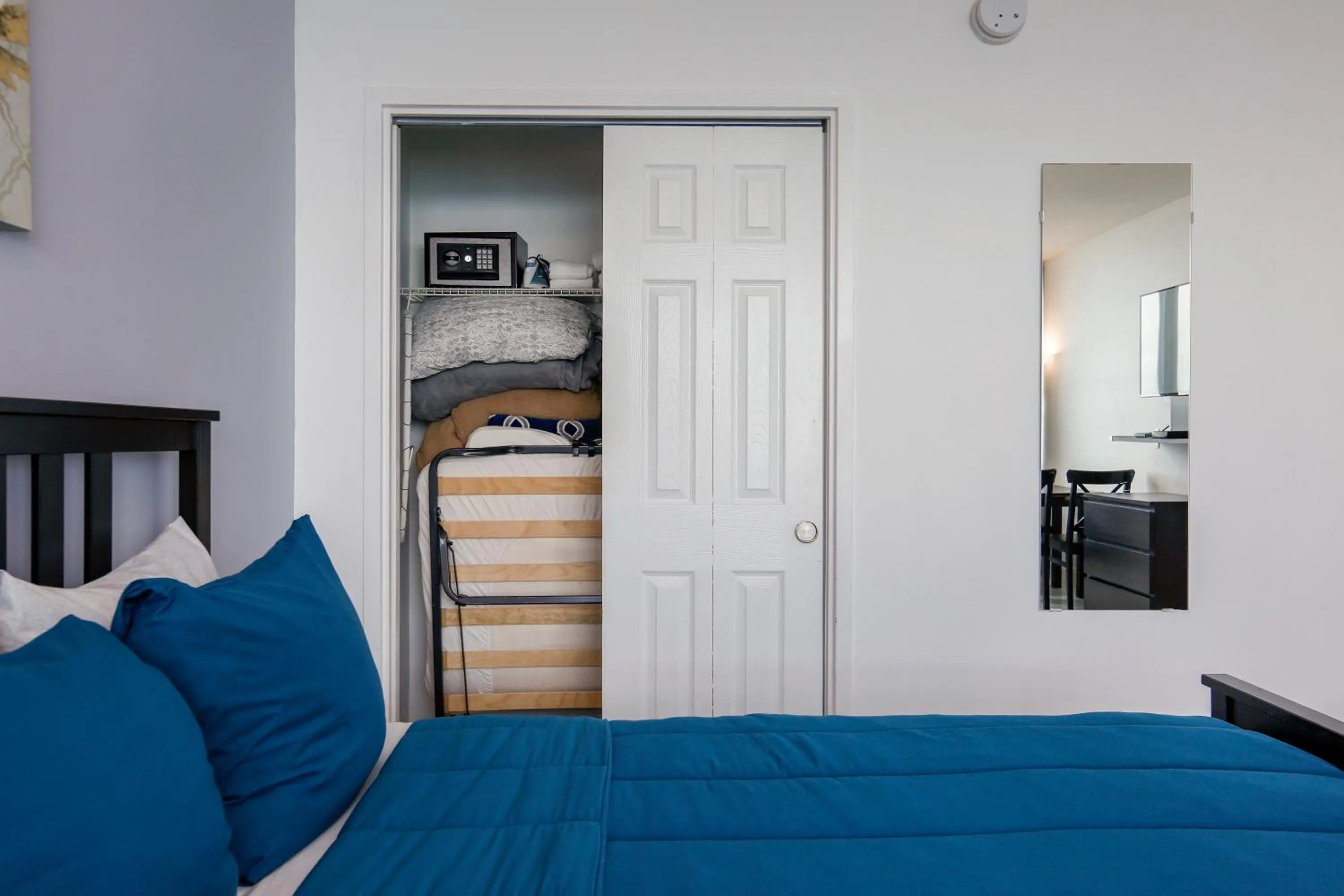 Bed in Miami Beach Apartments by MiaRentals