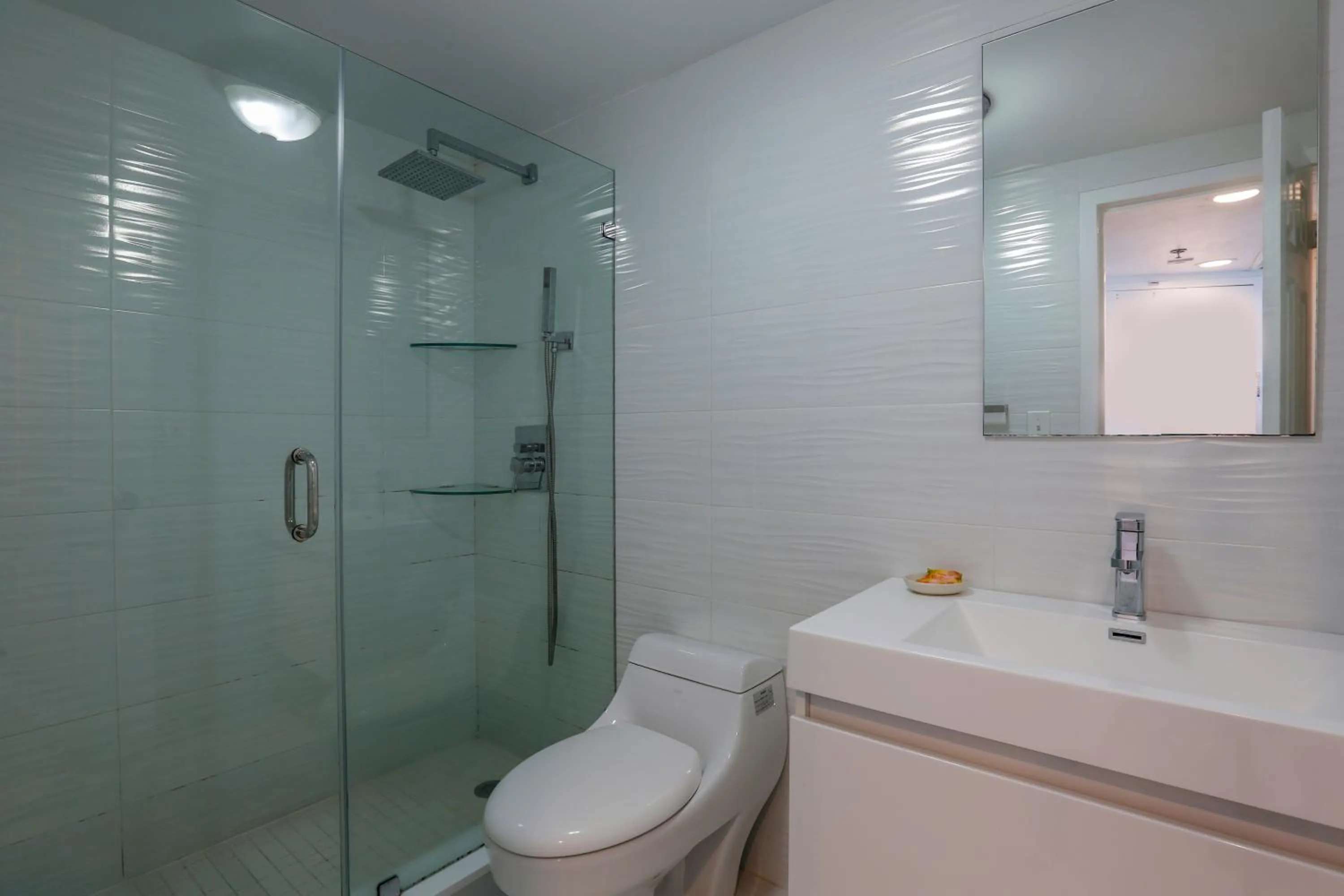 Shower in Miami Beach Apartments by MiaRentals