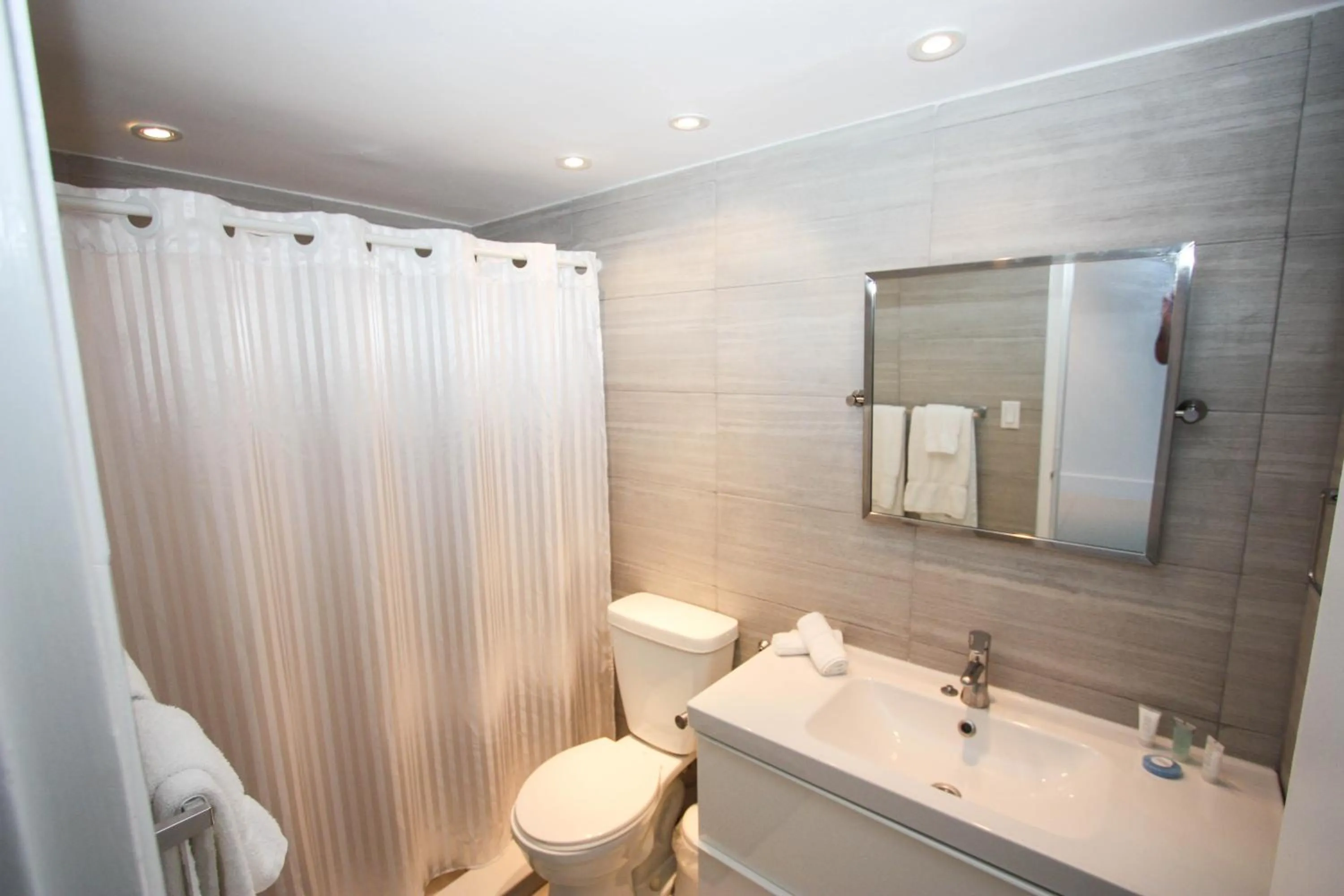 Bathroom in Miami Beach Apartments by MiaRentals