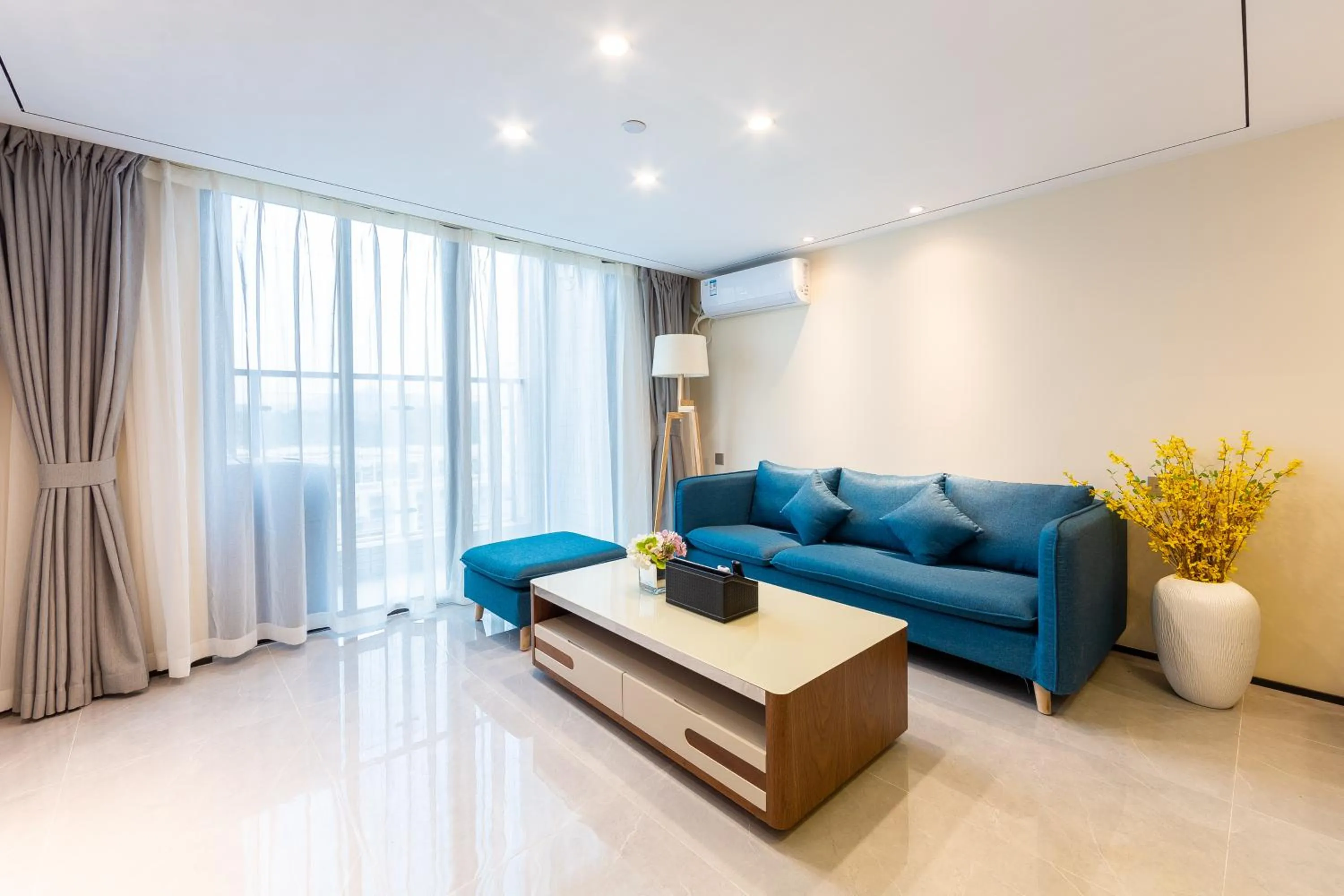 Living room in Serveyou International Apartment - Free Airport Pickup Service & Free Canton Fair Shuttle Bus