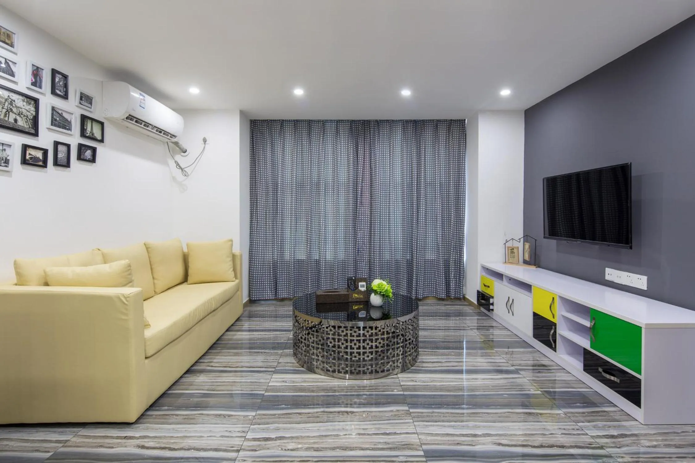 TV and multimedia in Serveyou International Apartment - Free Airport Pickup Service & Free Canton Fair Shuttle Bus