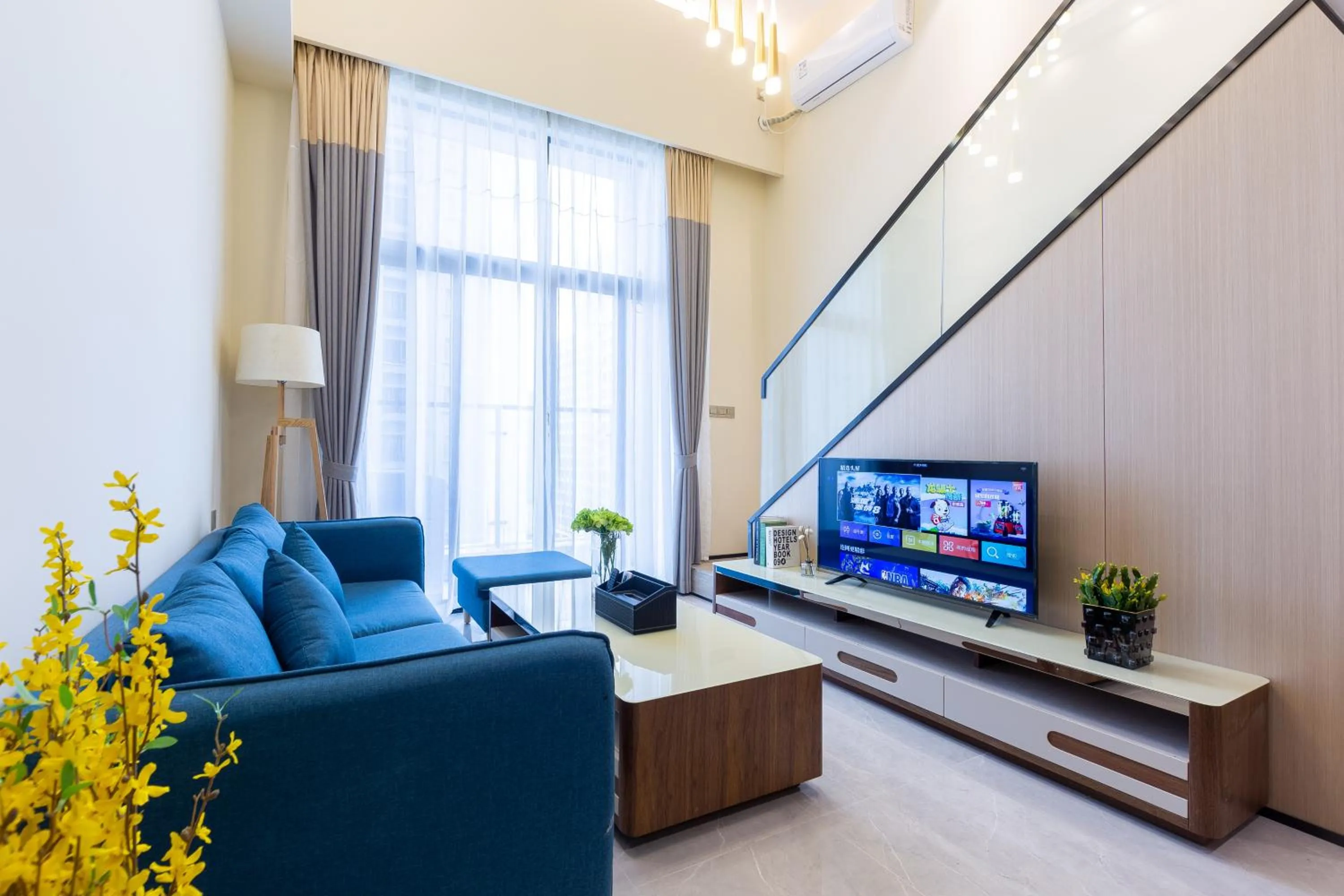 TV and multimedia in Serveyou International Apartment - Free Airport Pickup Service & Free Canton Fair Shuttle Bus
