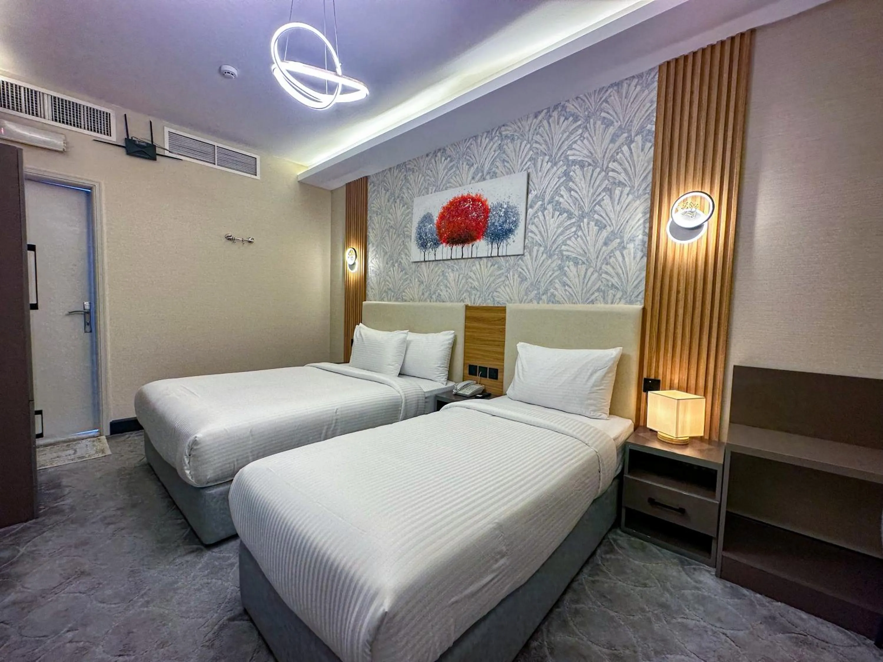 Photo of the whole room, Bed in GOLD SKY AVENUE HOTEL