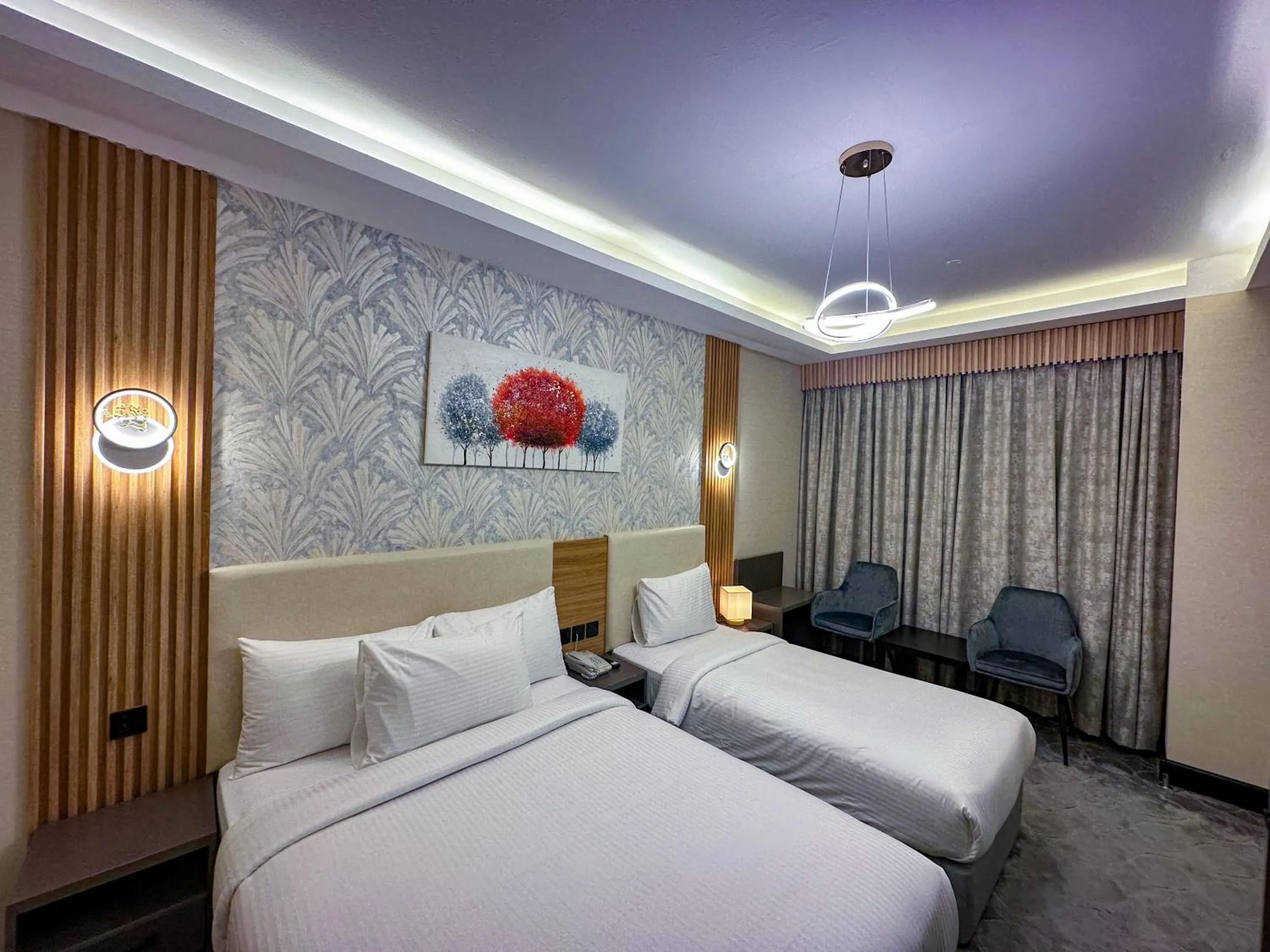 Photo of the whole room, Bed in GOLD SKY AVENUE HOTEL