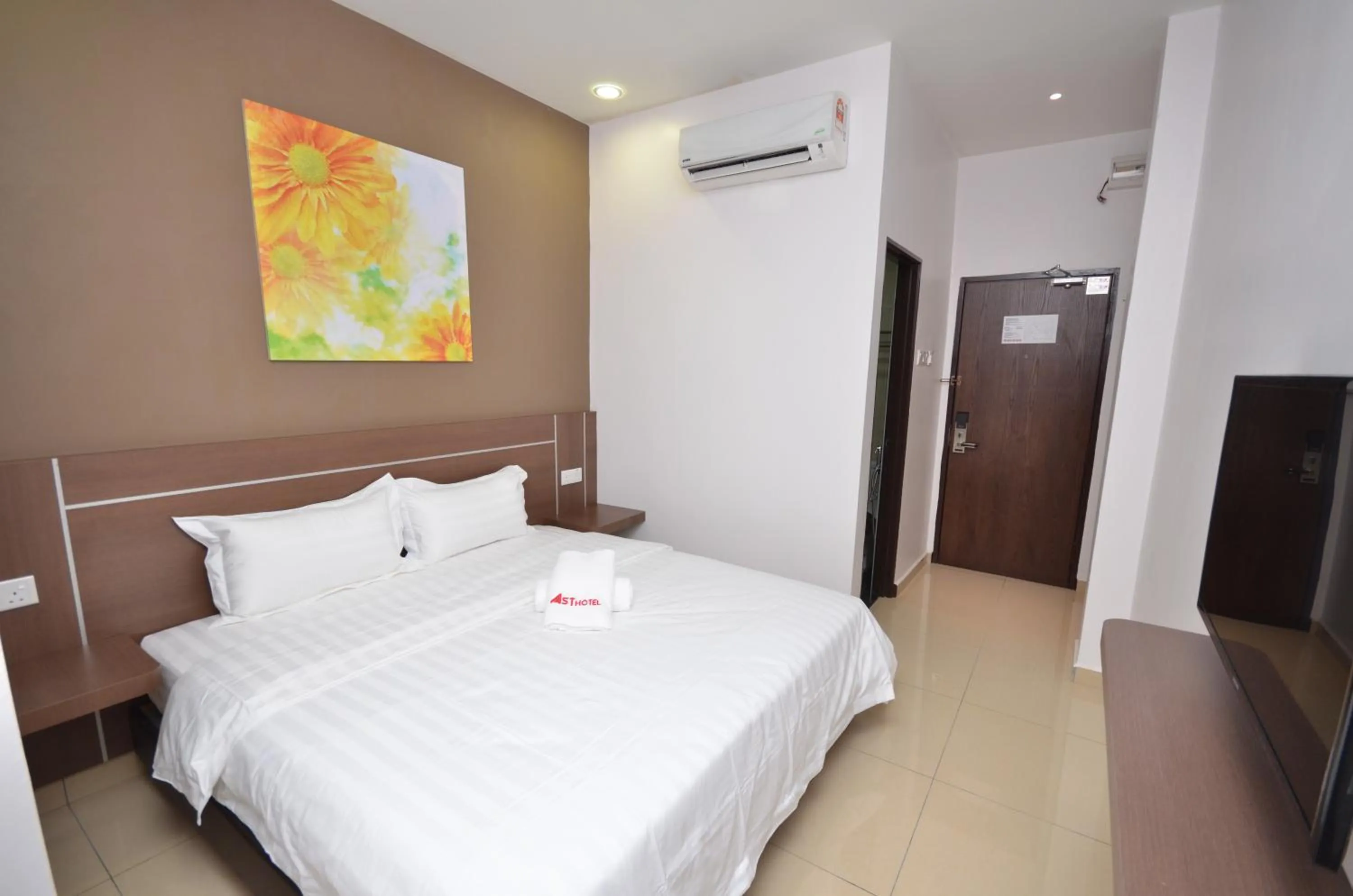 Photo of the whole room, Bed in AST Hotel