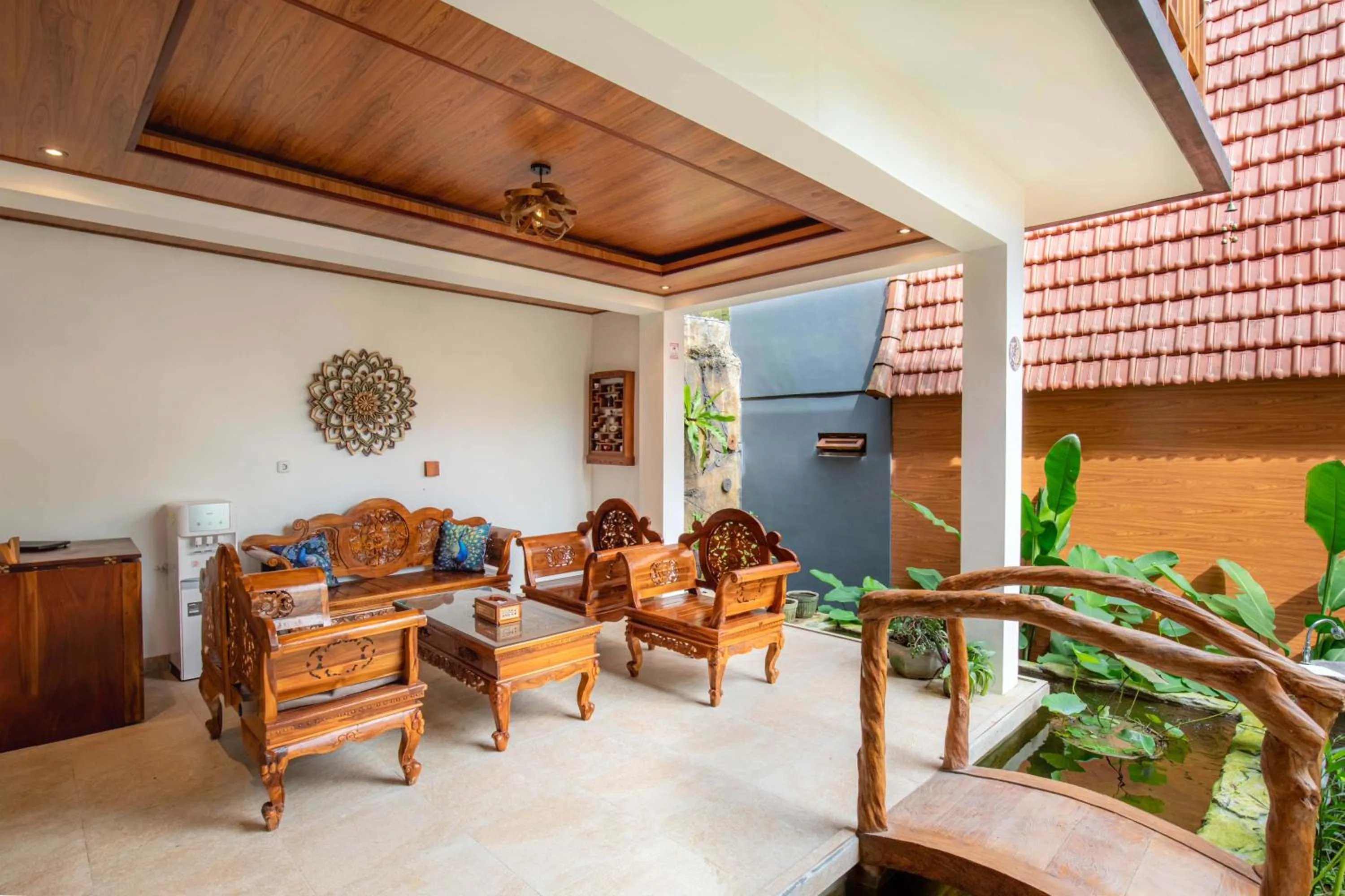 Communal lounge/ TV room in Uma Nandhi Villa Ubud