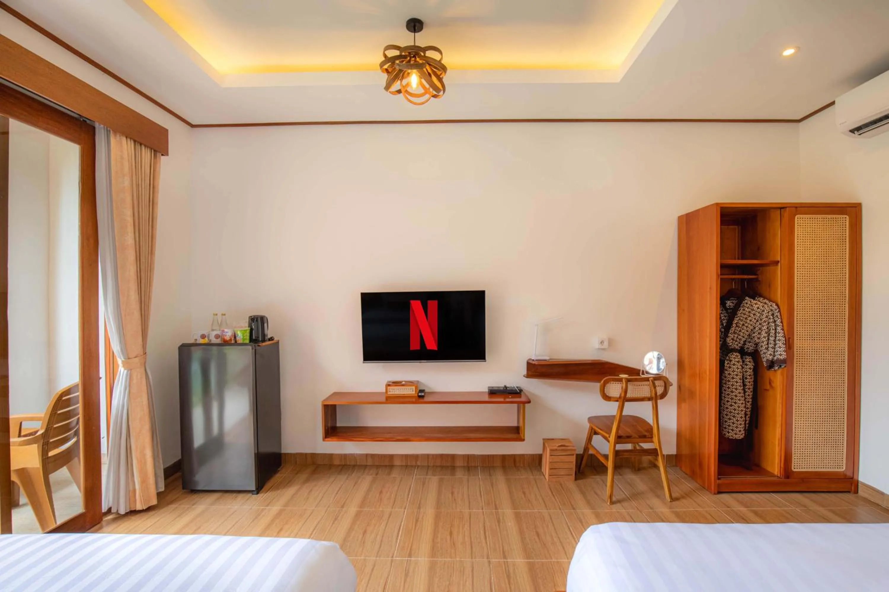 TV and multimedia, Bed in Uma Nandhi Villa Ubud