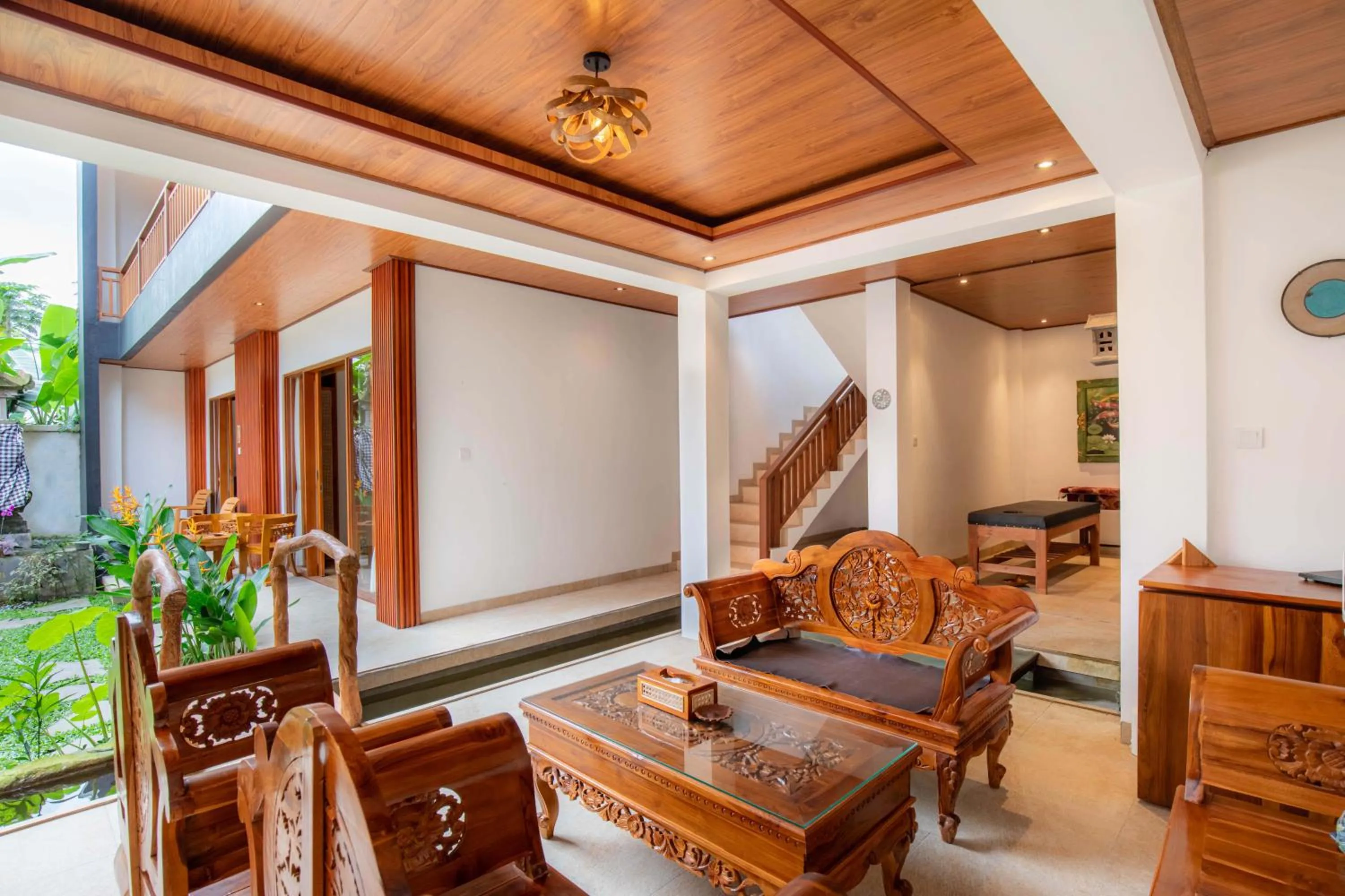 Communal lounge/ TV room in Uma Nandhi Villa Ubud