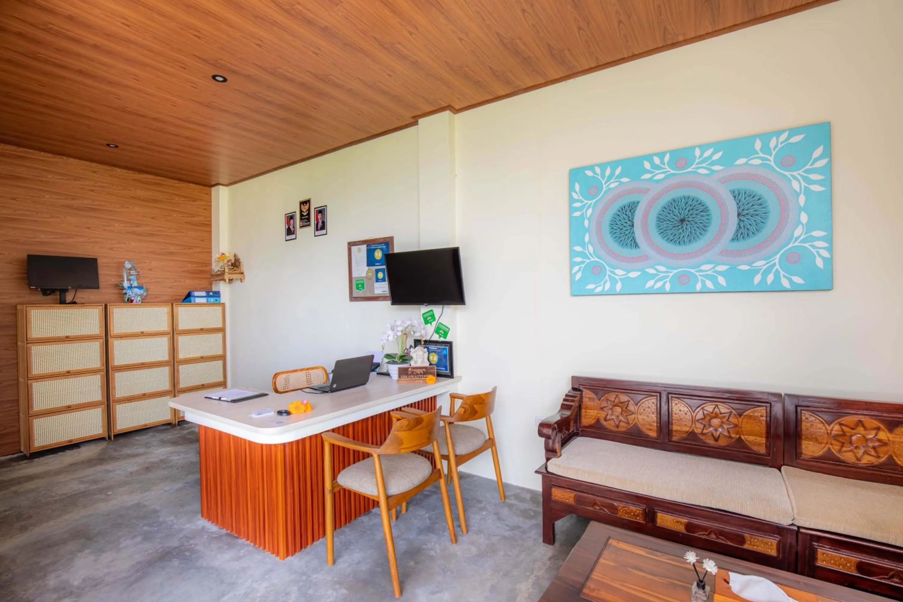 Communal lounge/ TV room in Uma Nandhi Villa Ubud