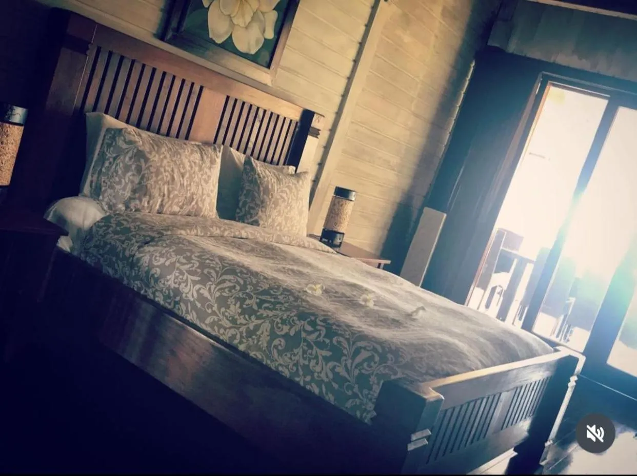Bed in Imaj Private Villas