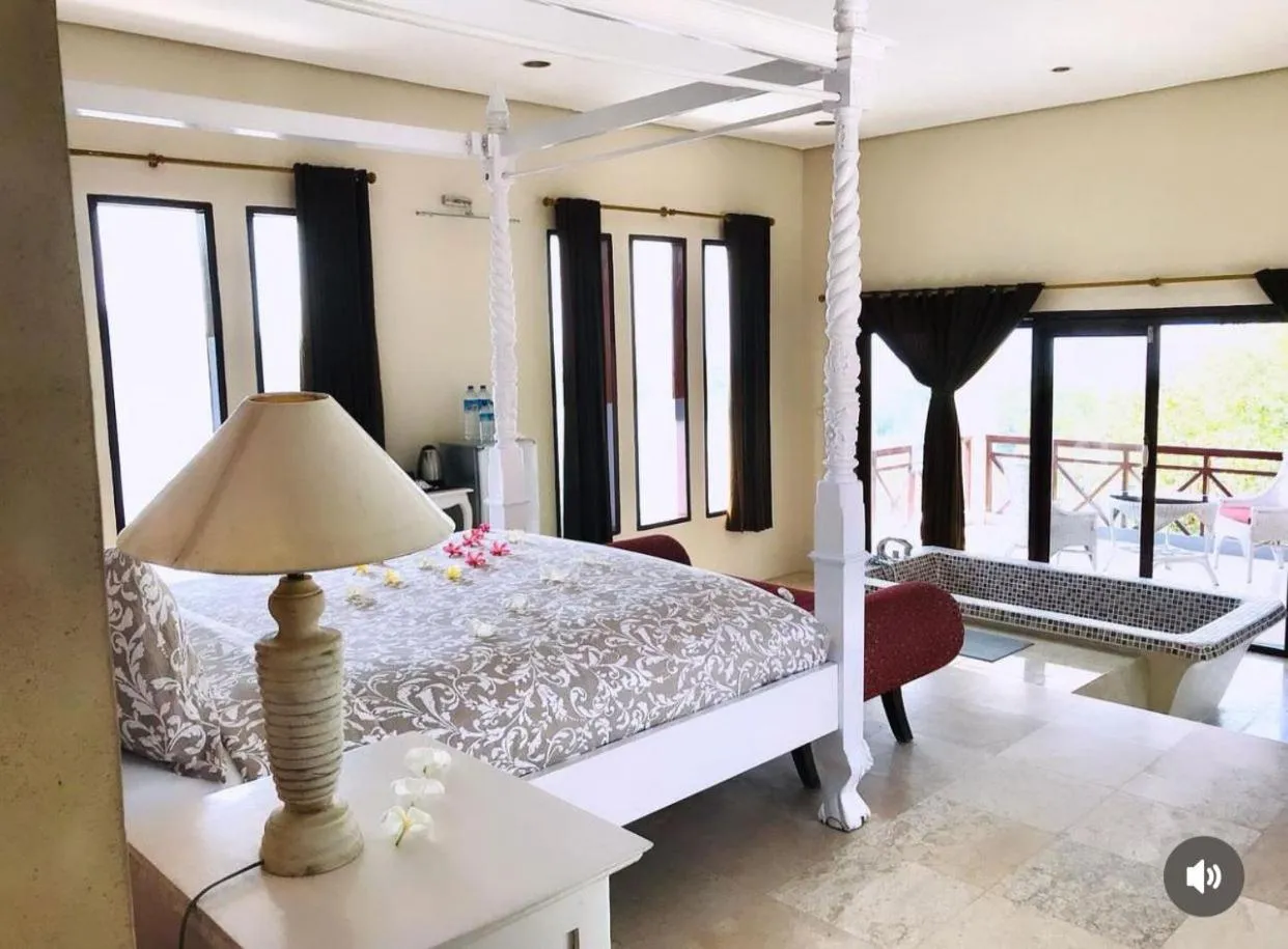 Bed in Imaj Private Villas