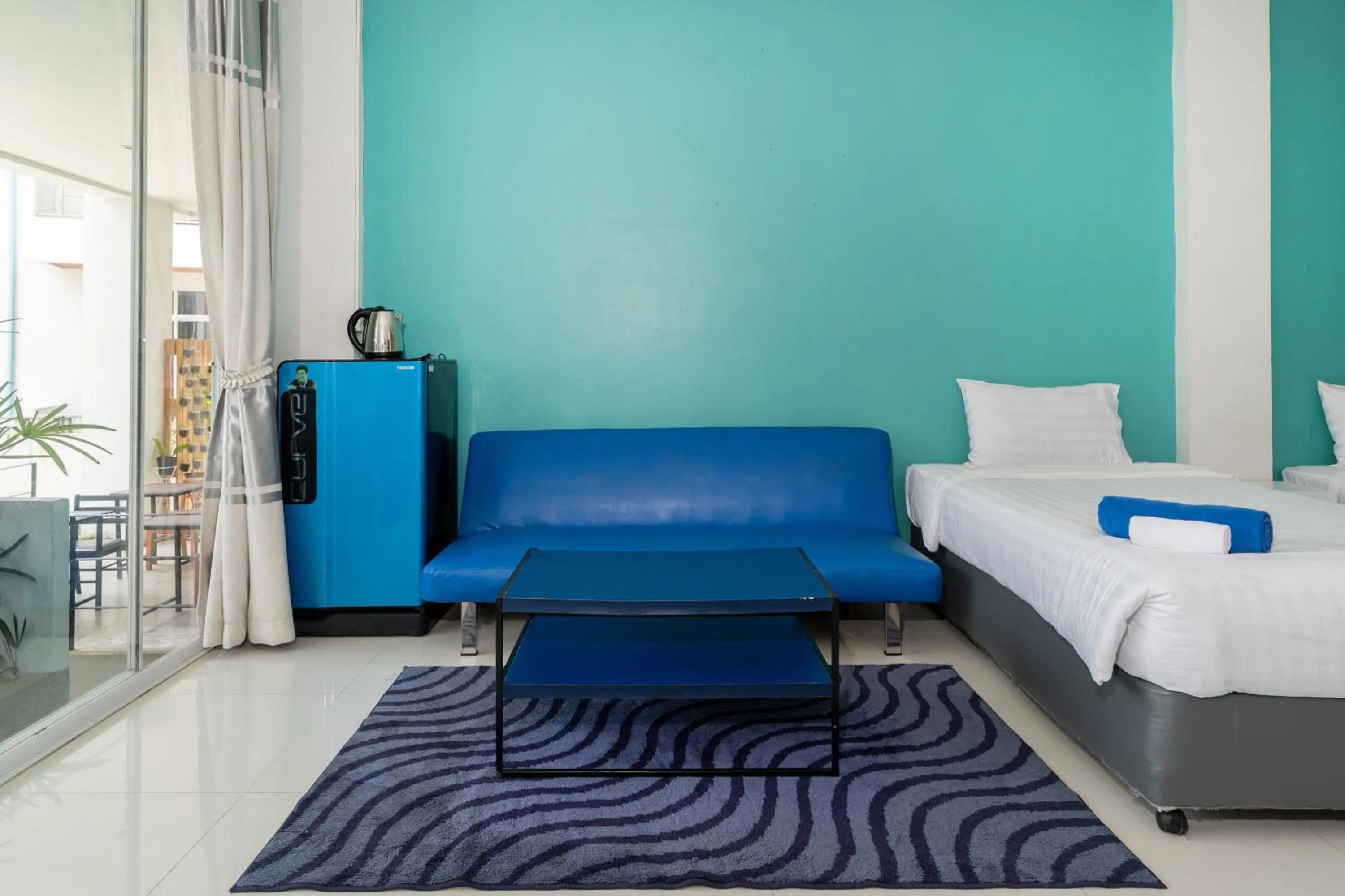 Living room, Bed in Kata Sea Boutique