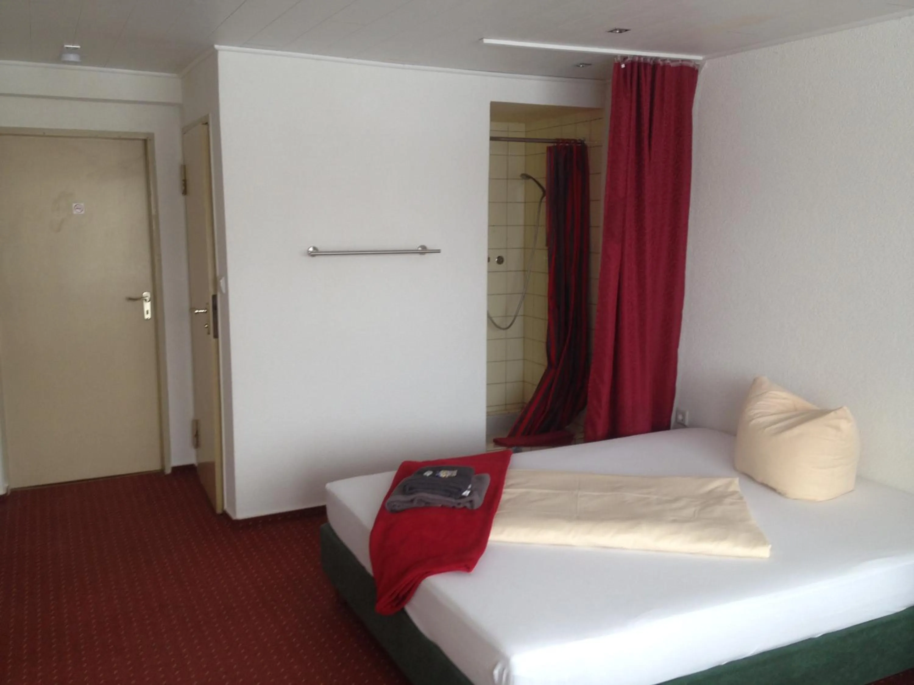 Photo of the whole room, Bed in Hotel Saarland Lebach
