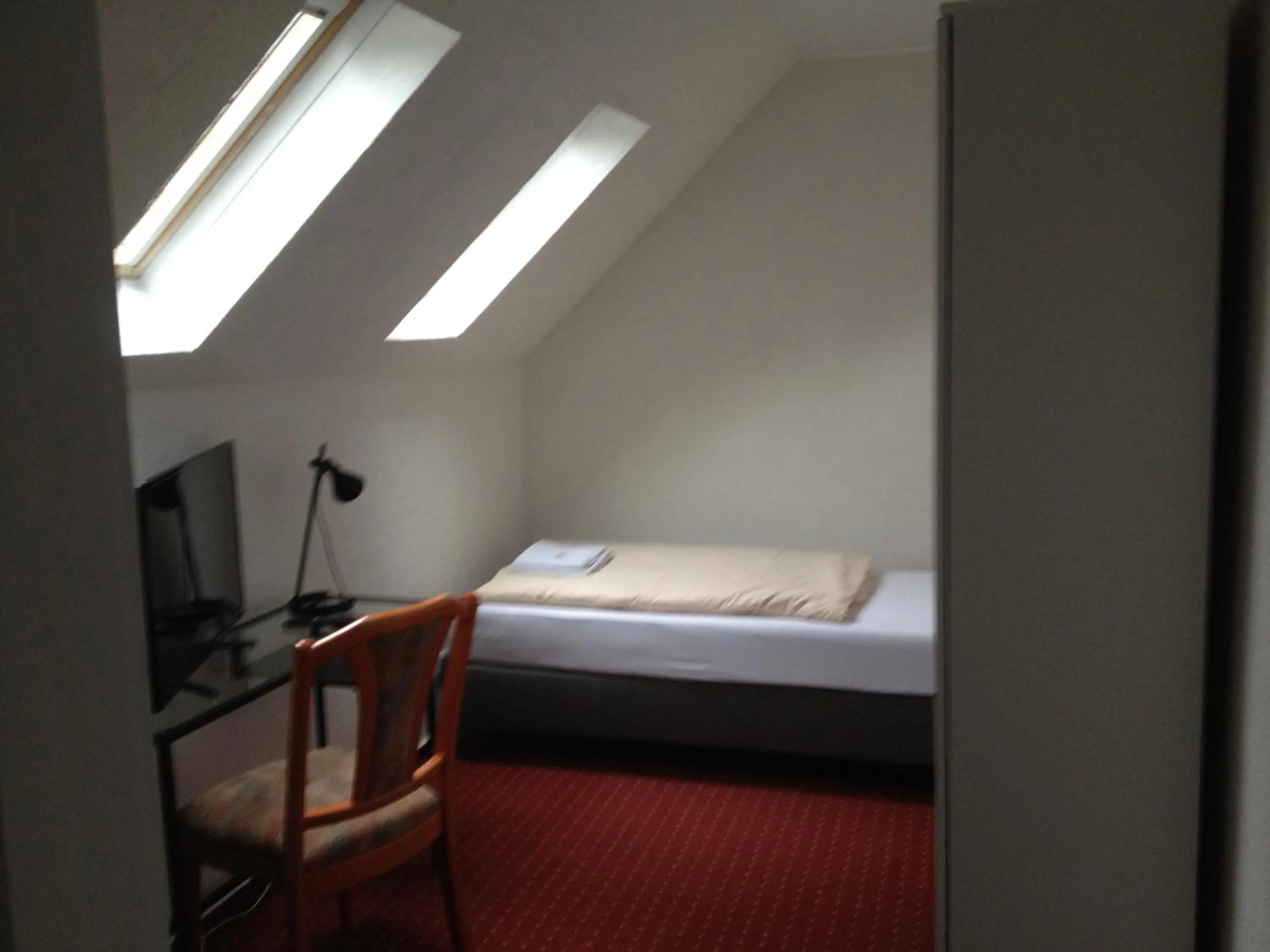 Bedroom, Bed in Hotel Saarland Lebach