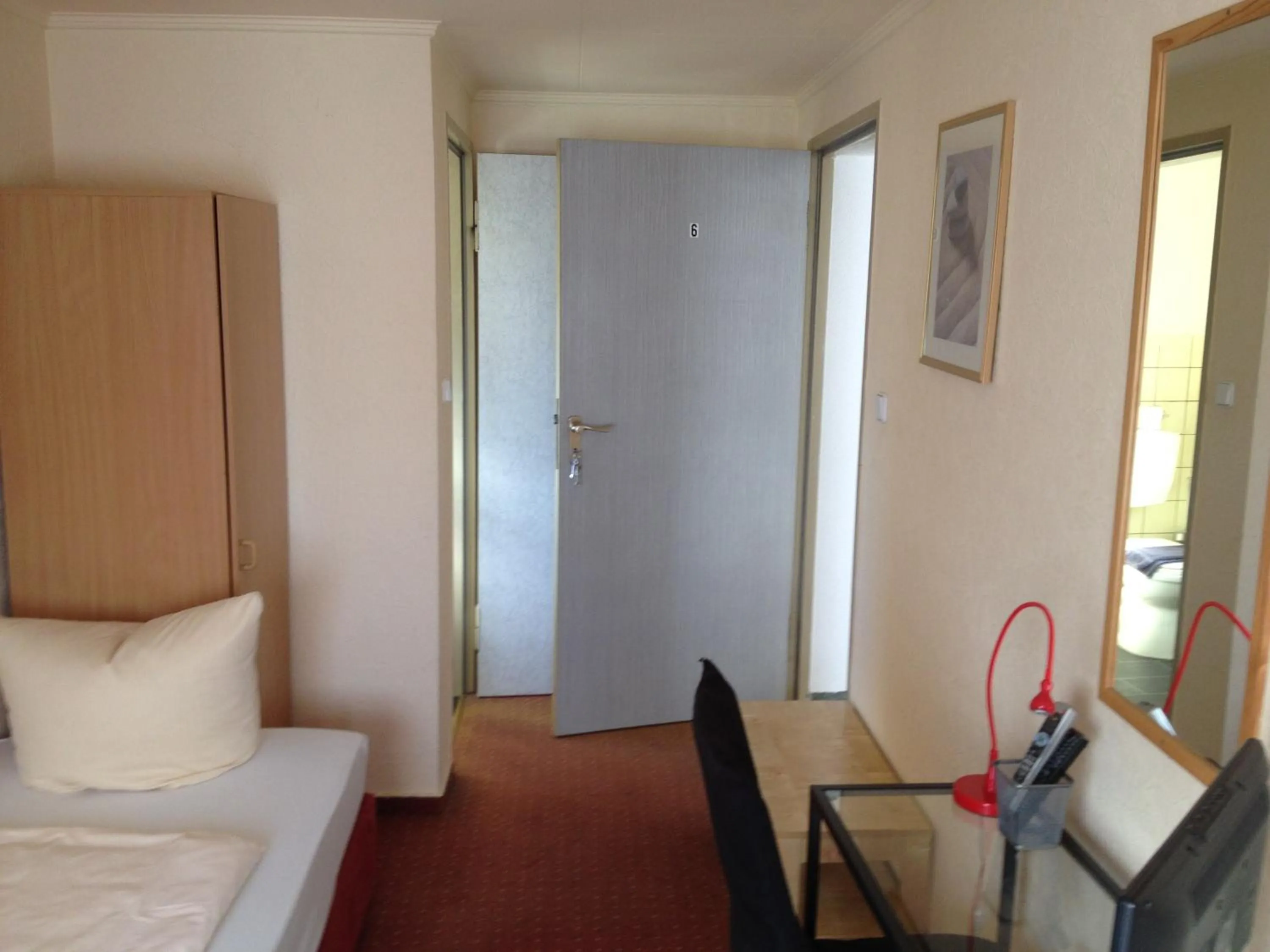 Photo of the whole room, Bed in Hotel Saarland Lebach