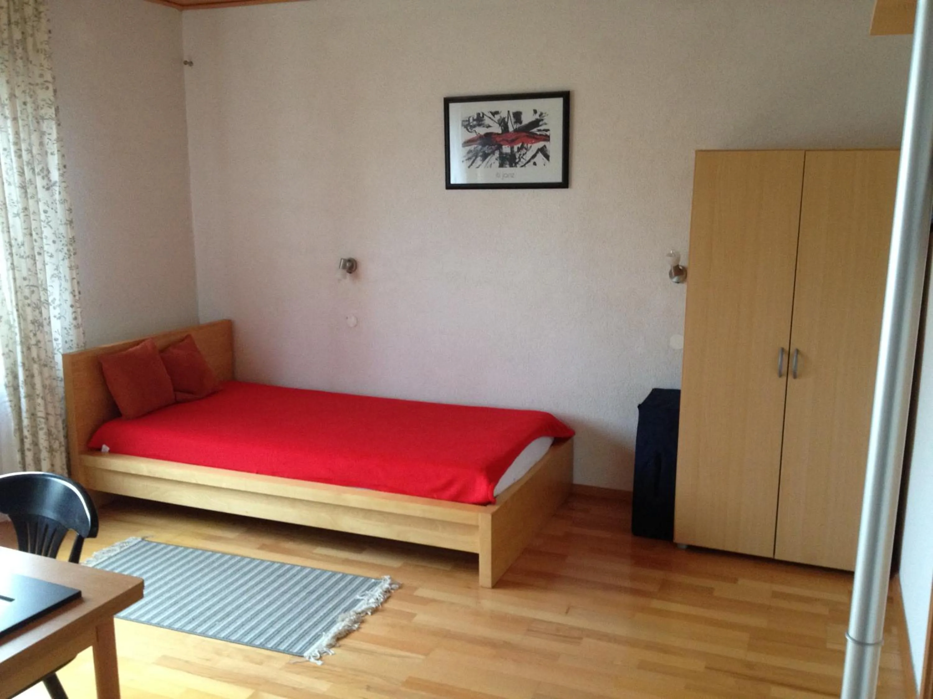 Living room, Bed in Hotel Saarland Lebach