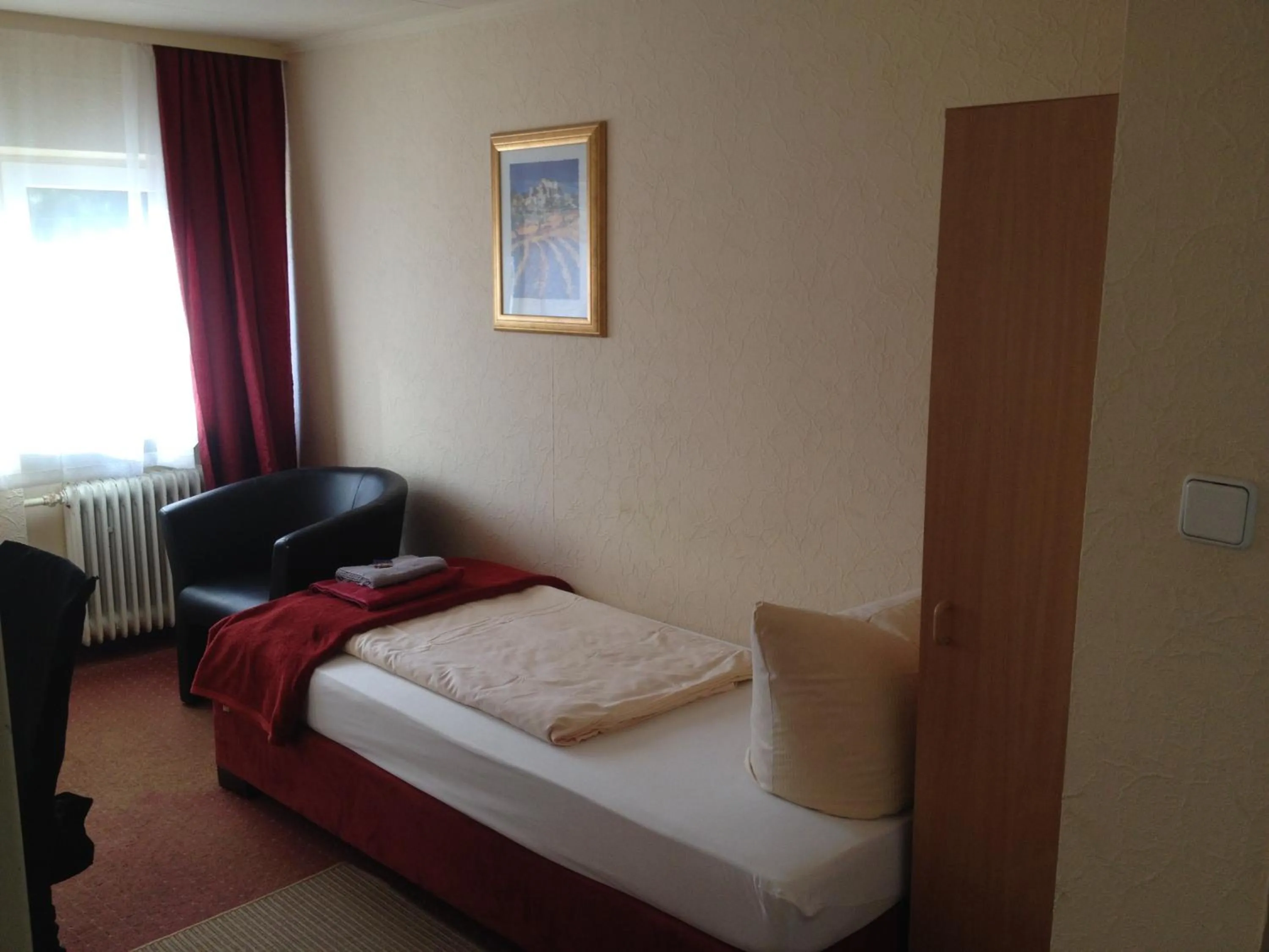 Photo of the whole room, Bed in Hotel Saarland Lebach