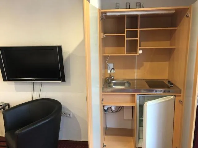 Kitchen or kitchenette in Hotel Saarland Lebach