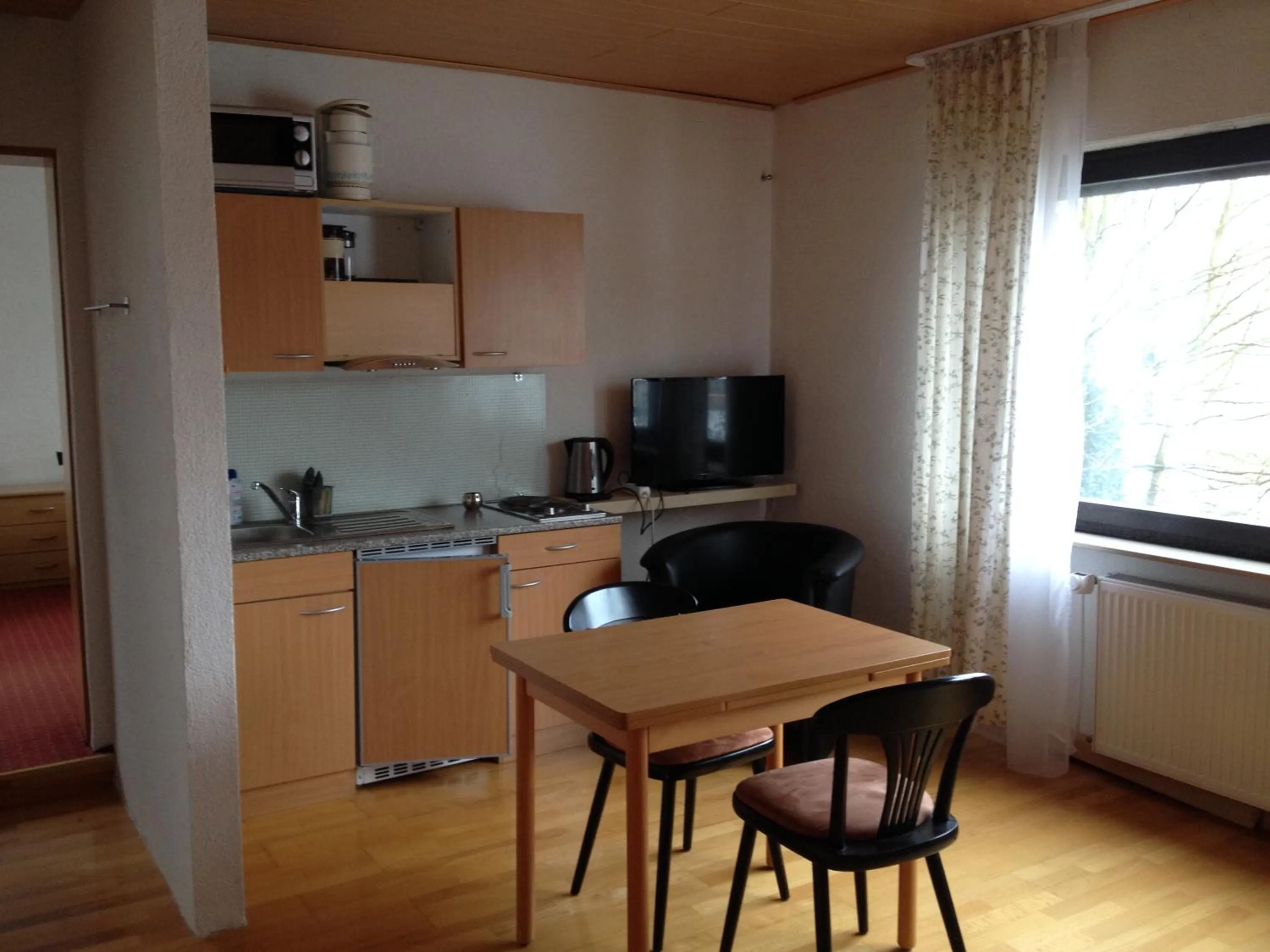 Kitchen or kitchenette in Hotel Saarland Lebach
