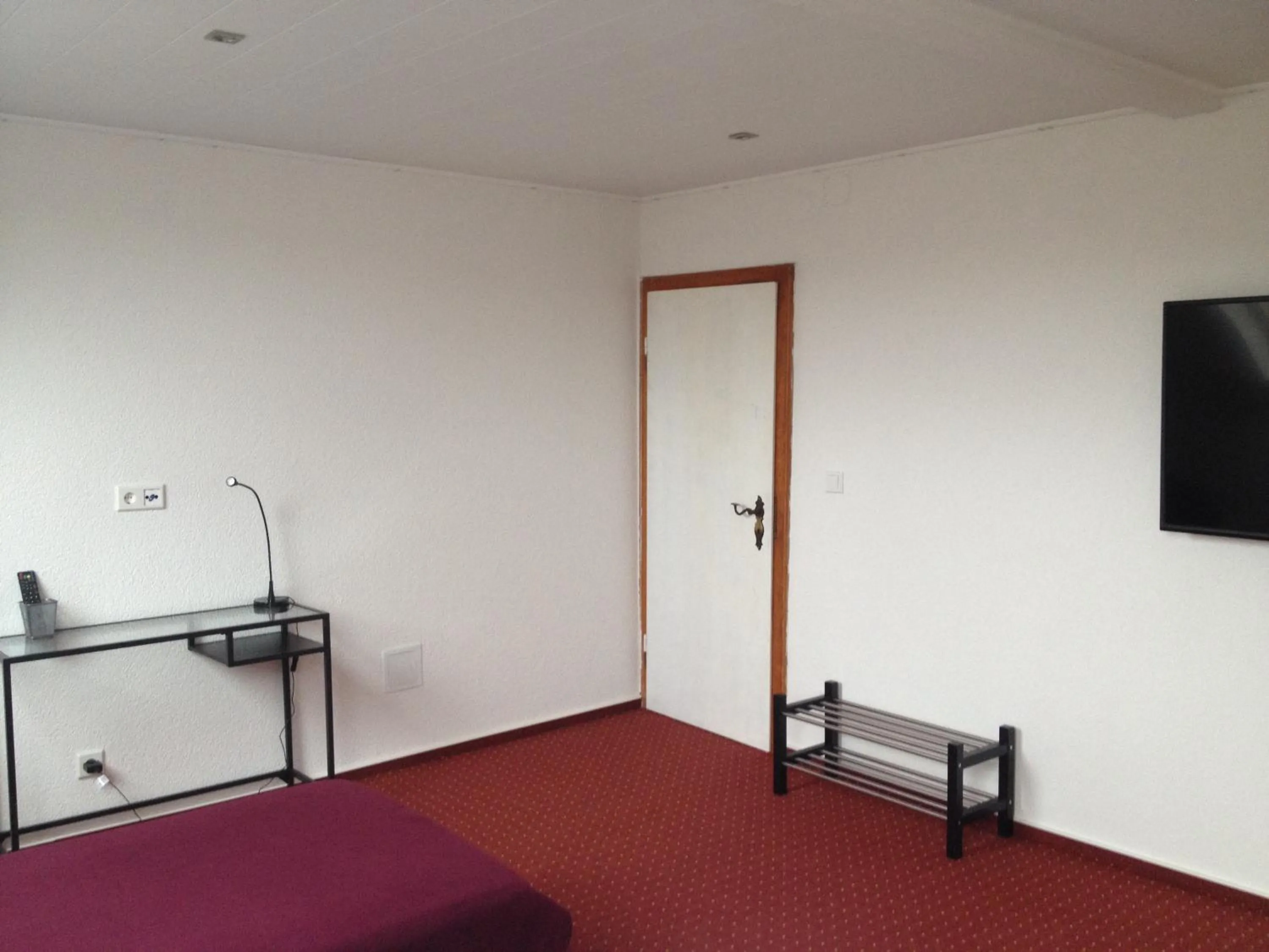 Photo of the whole room, Bed in Hotel Saarland Lebach