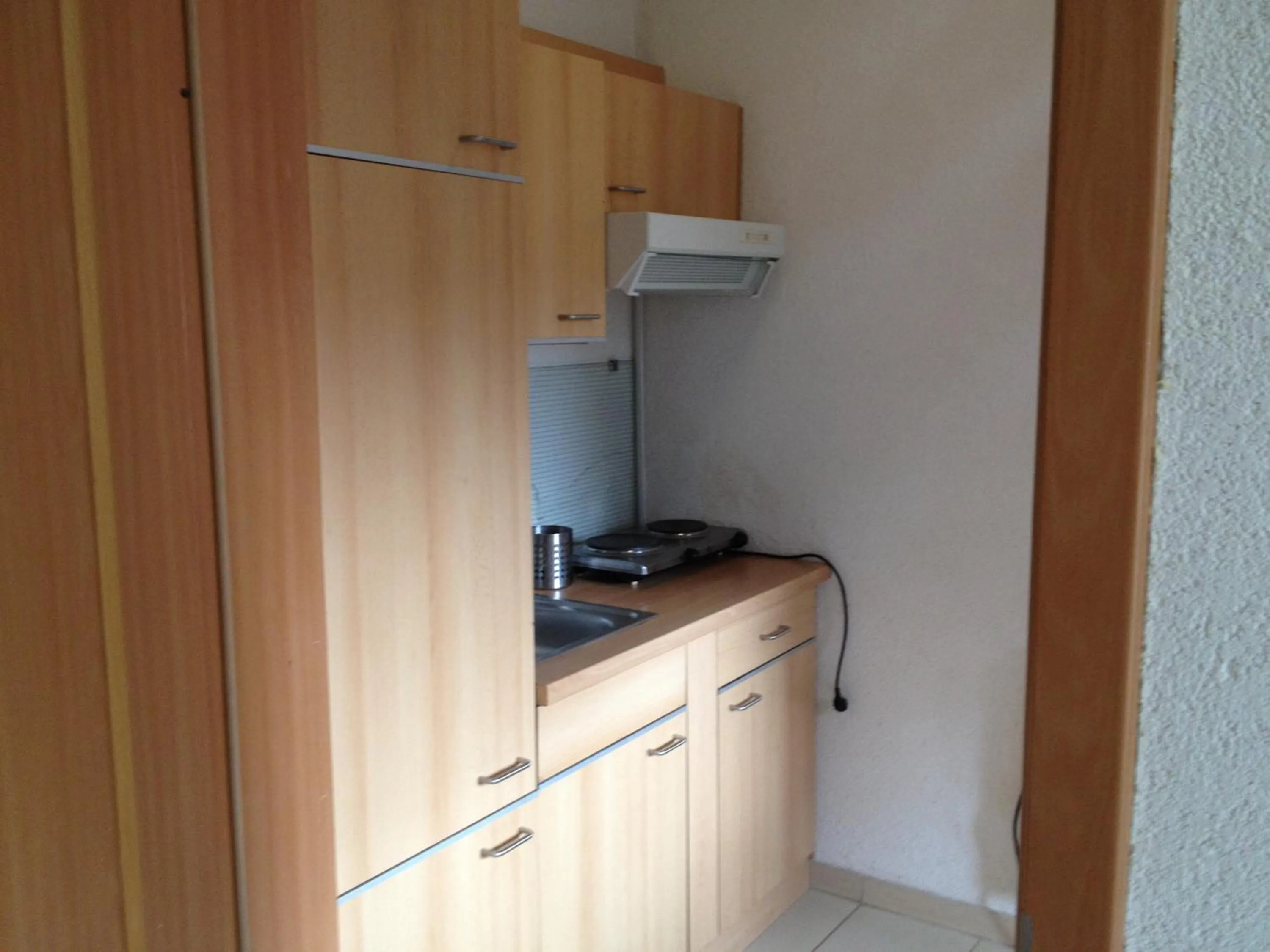 Kitchen or kitchenette in Hotel Saarland Lebach