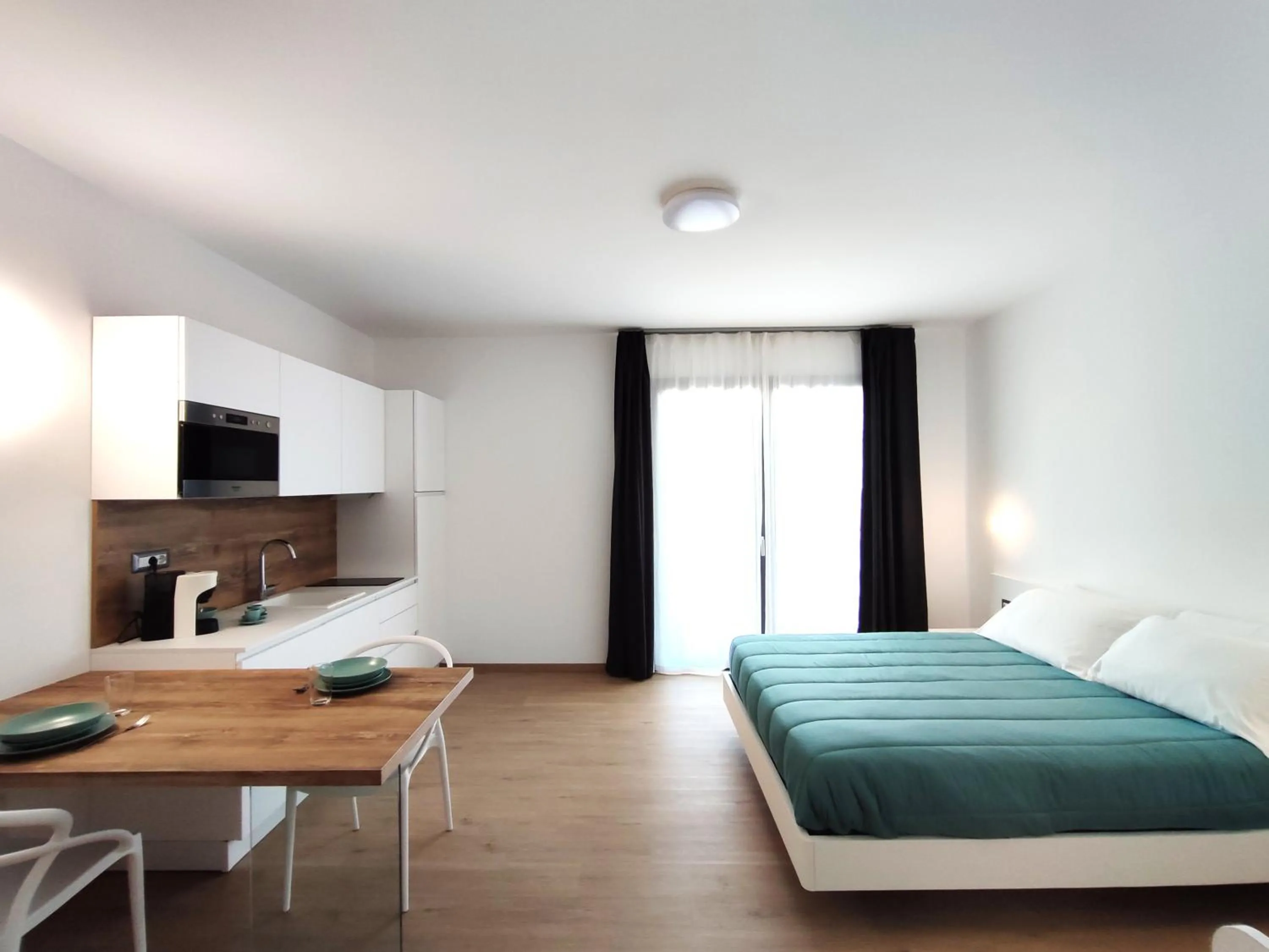 Bed in Residence Cala Bianca