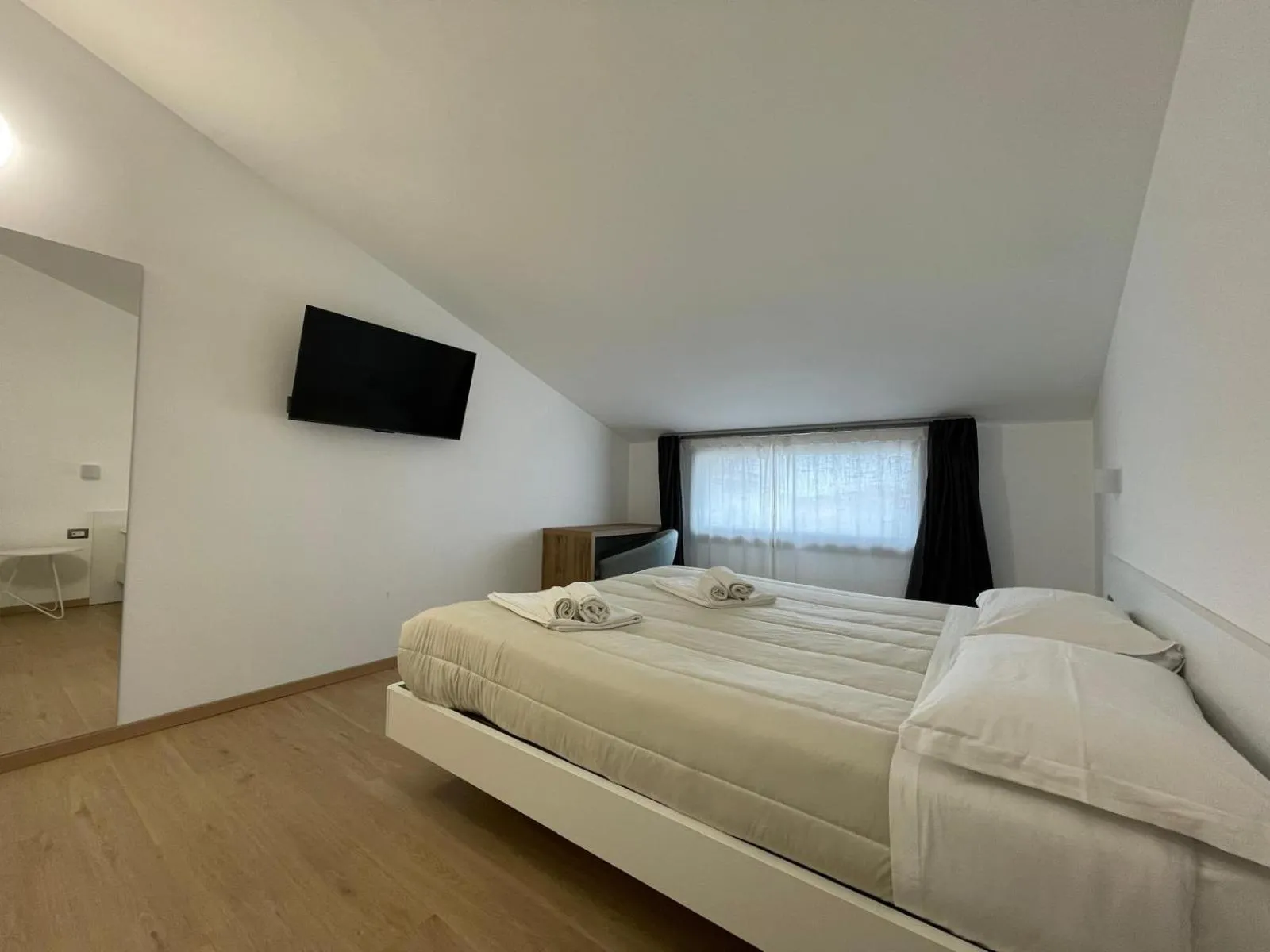 Bed in Residence Cala Bianca