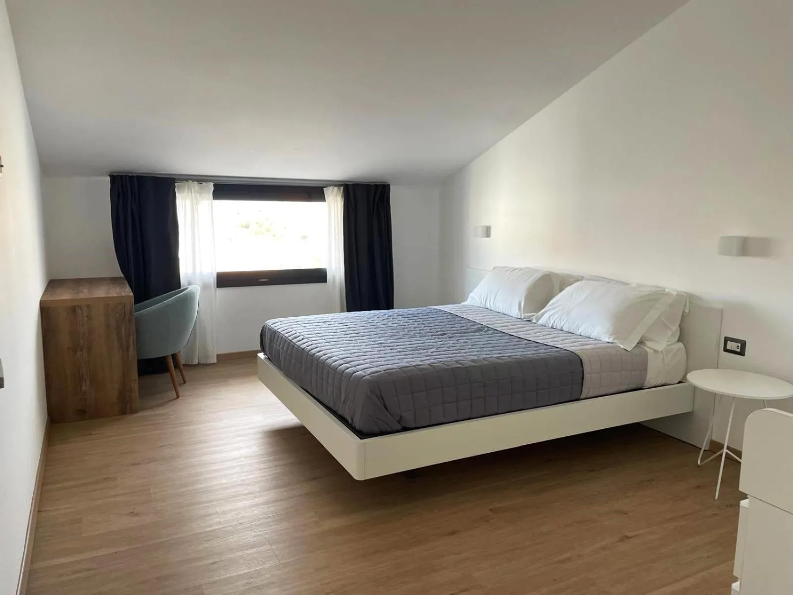 Bed in Residence Cala Bianca