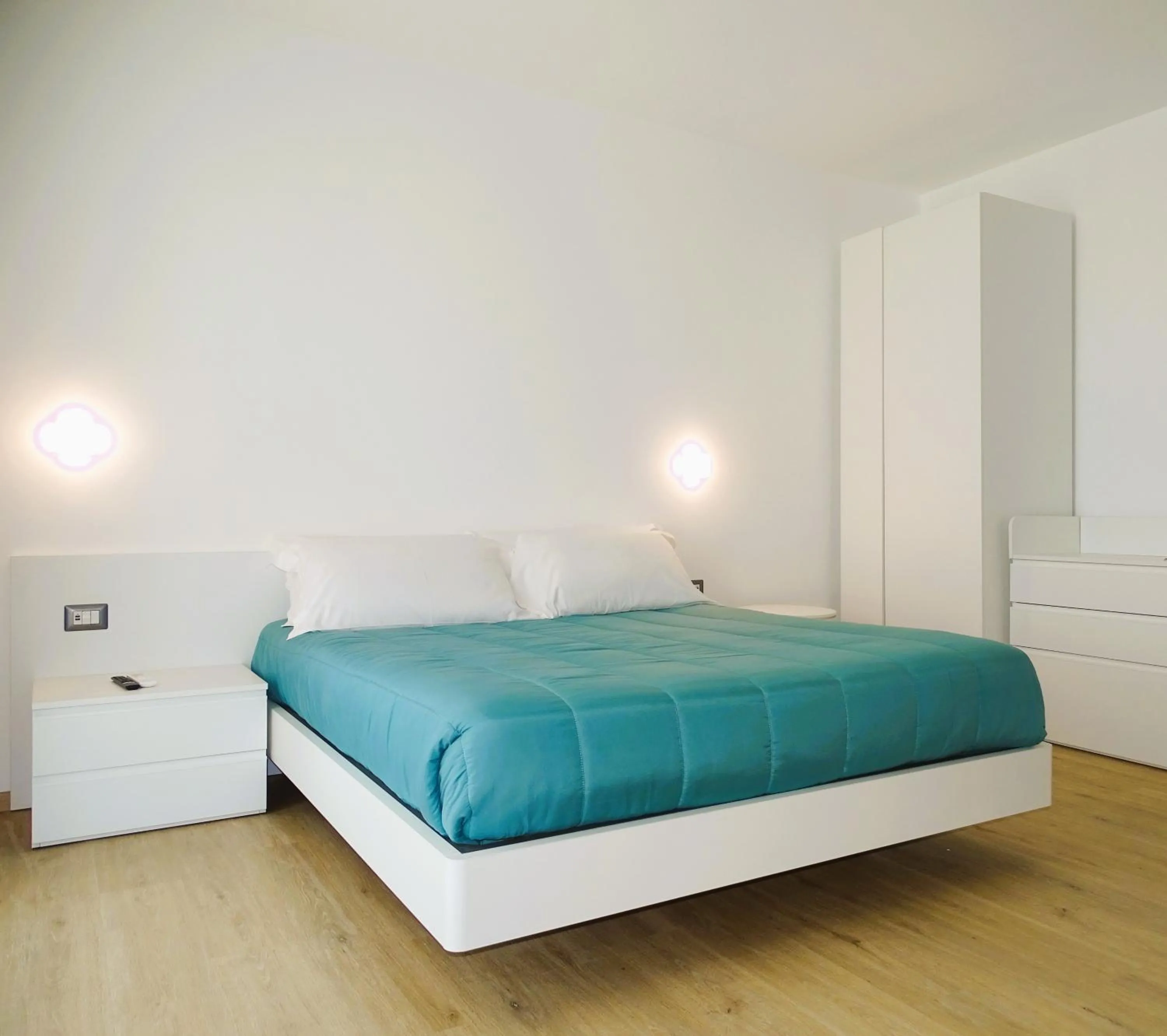 Bed in Residence Cala Bianca
