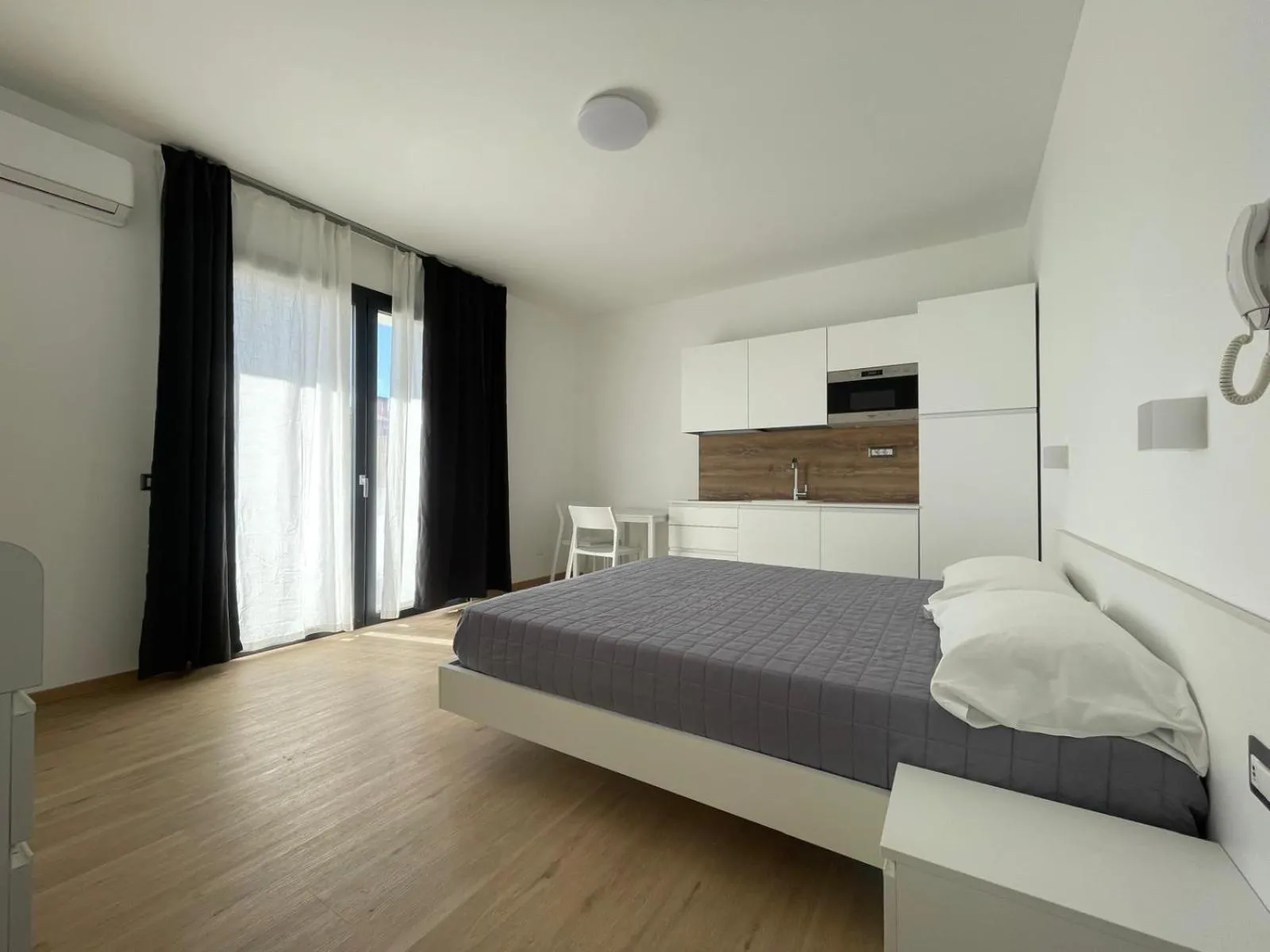 Bed in Residence Cala Bianca