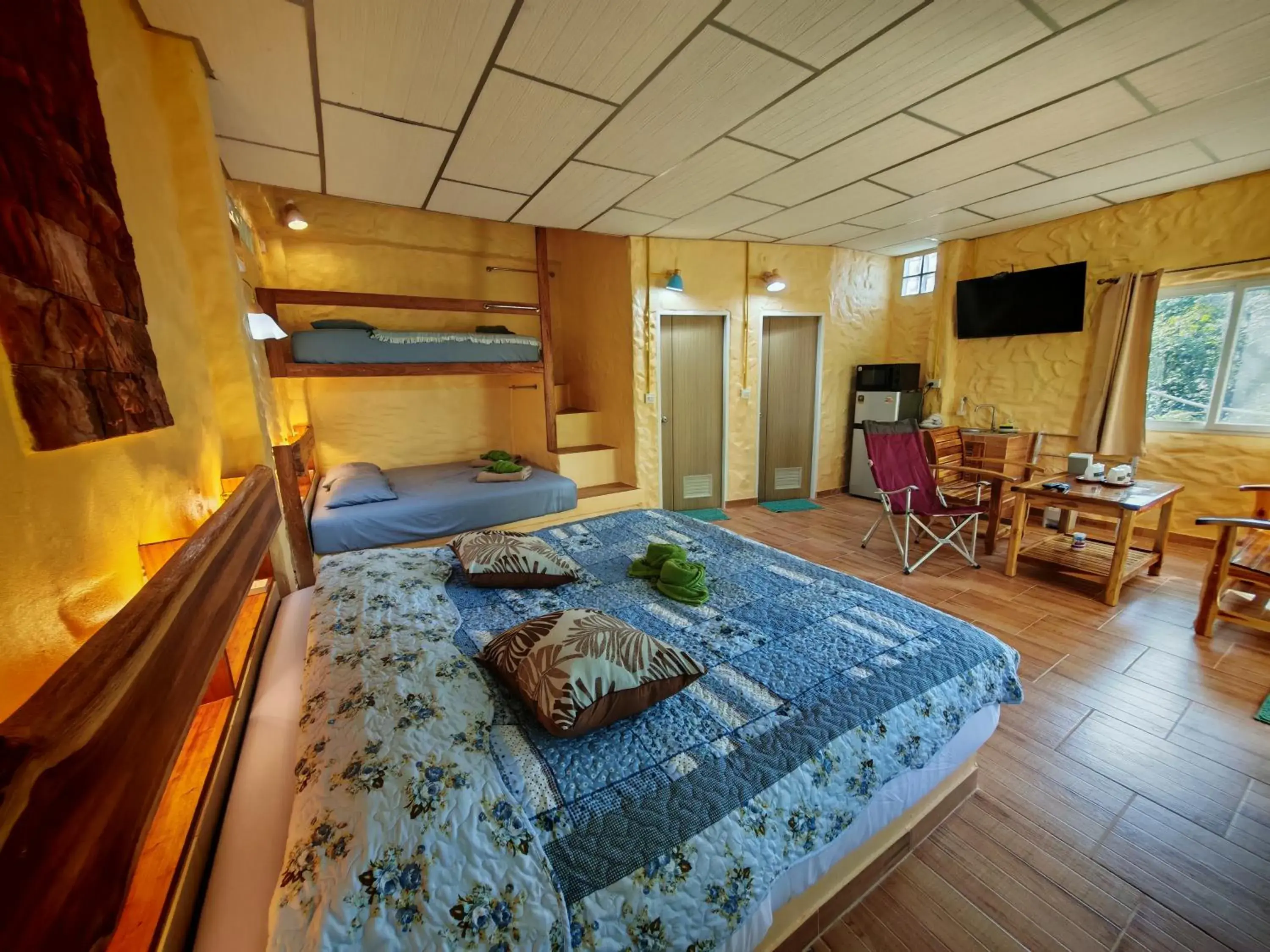 Communal lounge/ TV room, Bed in Baandin Chiewlarn Communal lounge/ TV room, Bed in Baandin Chiewlarn