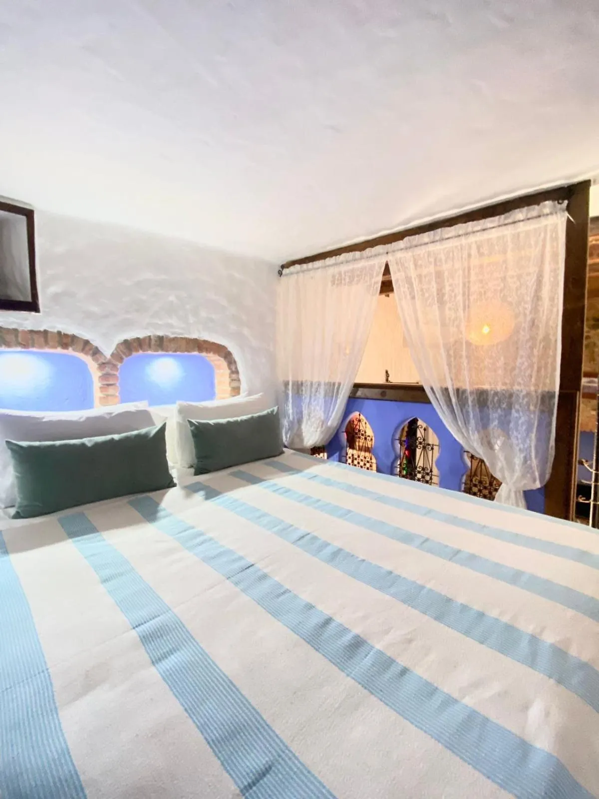 Bed in Riad Gharnata