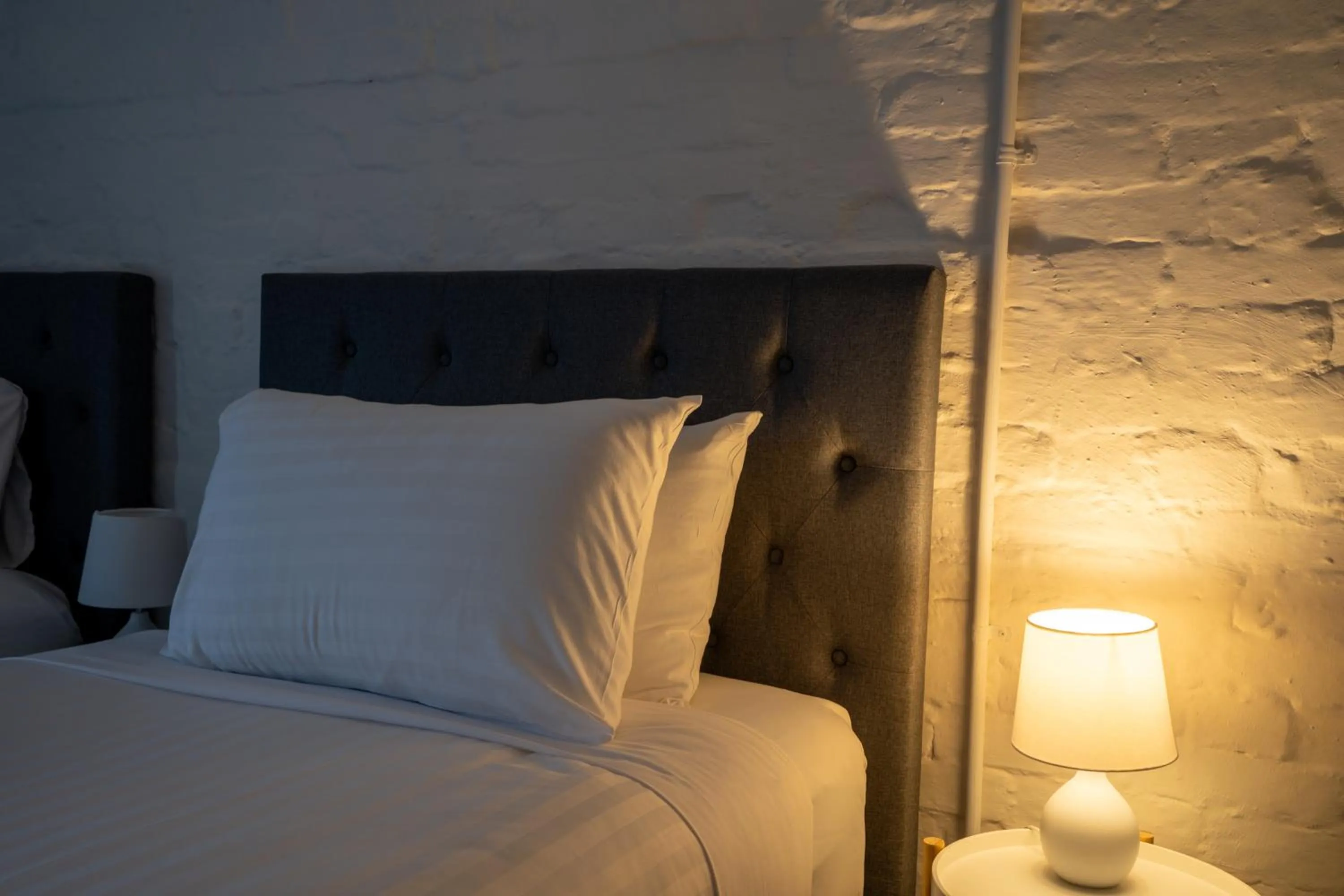 Bed in Urban Nook Serviced Apartments