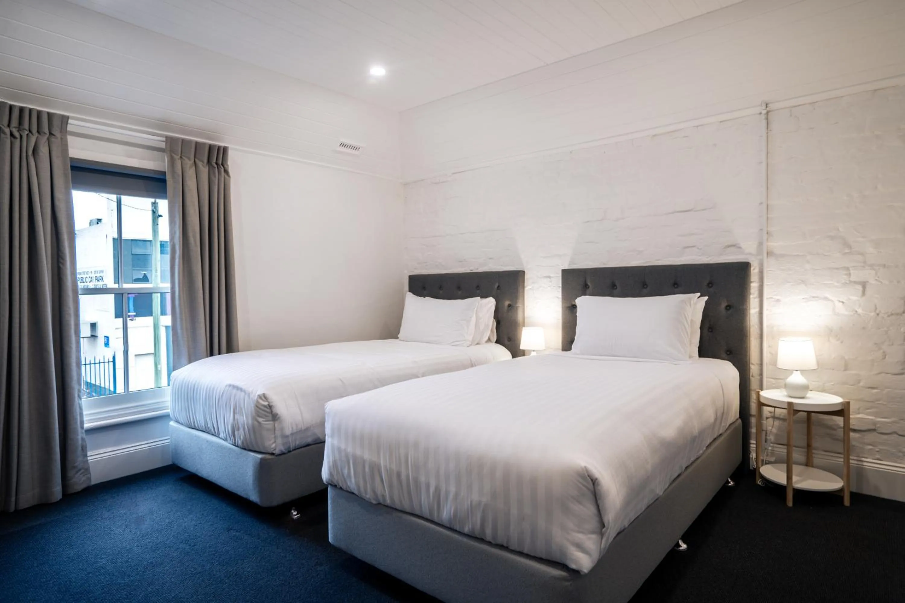 Bed in Urban Nook Serviced Apartments