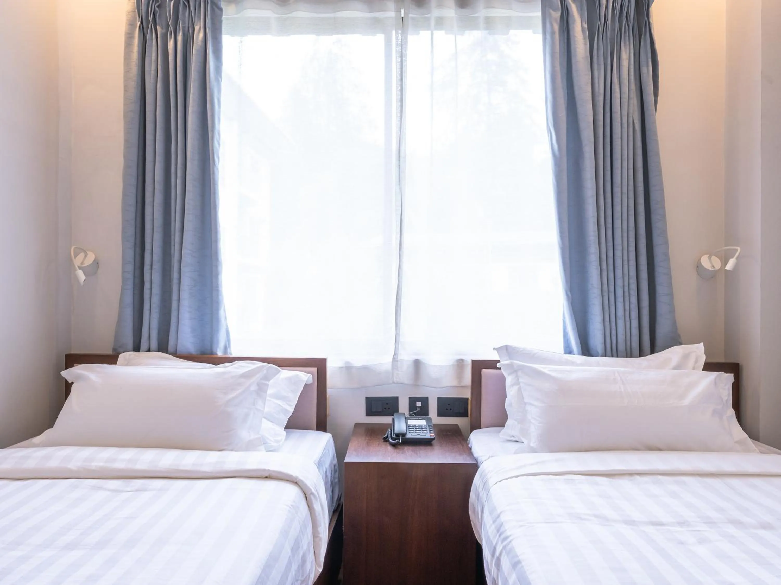 Bed in Hotel Samye - Best Hotel In Thimphu