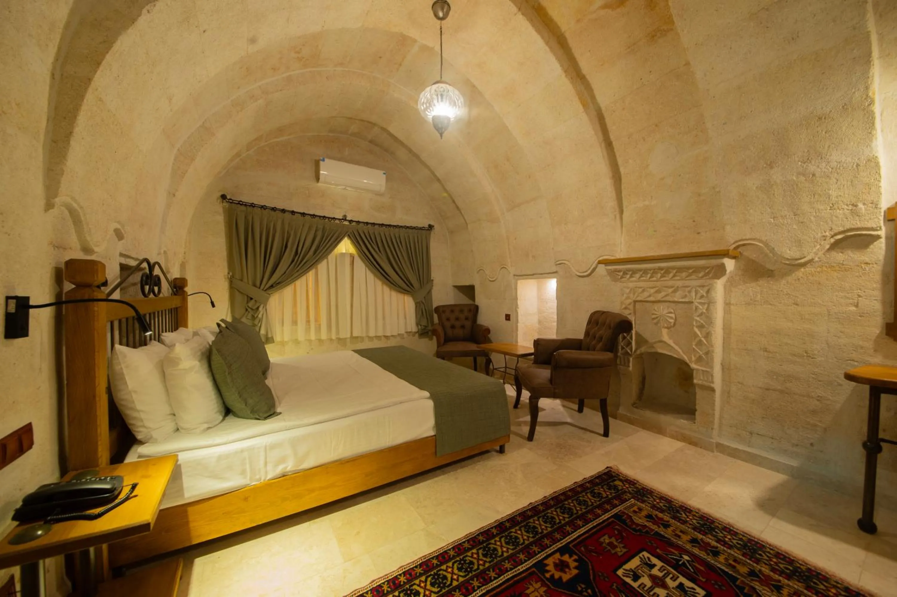 Bedroom, Bed in Ares Cave Suites