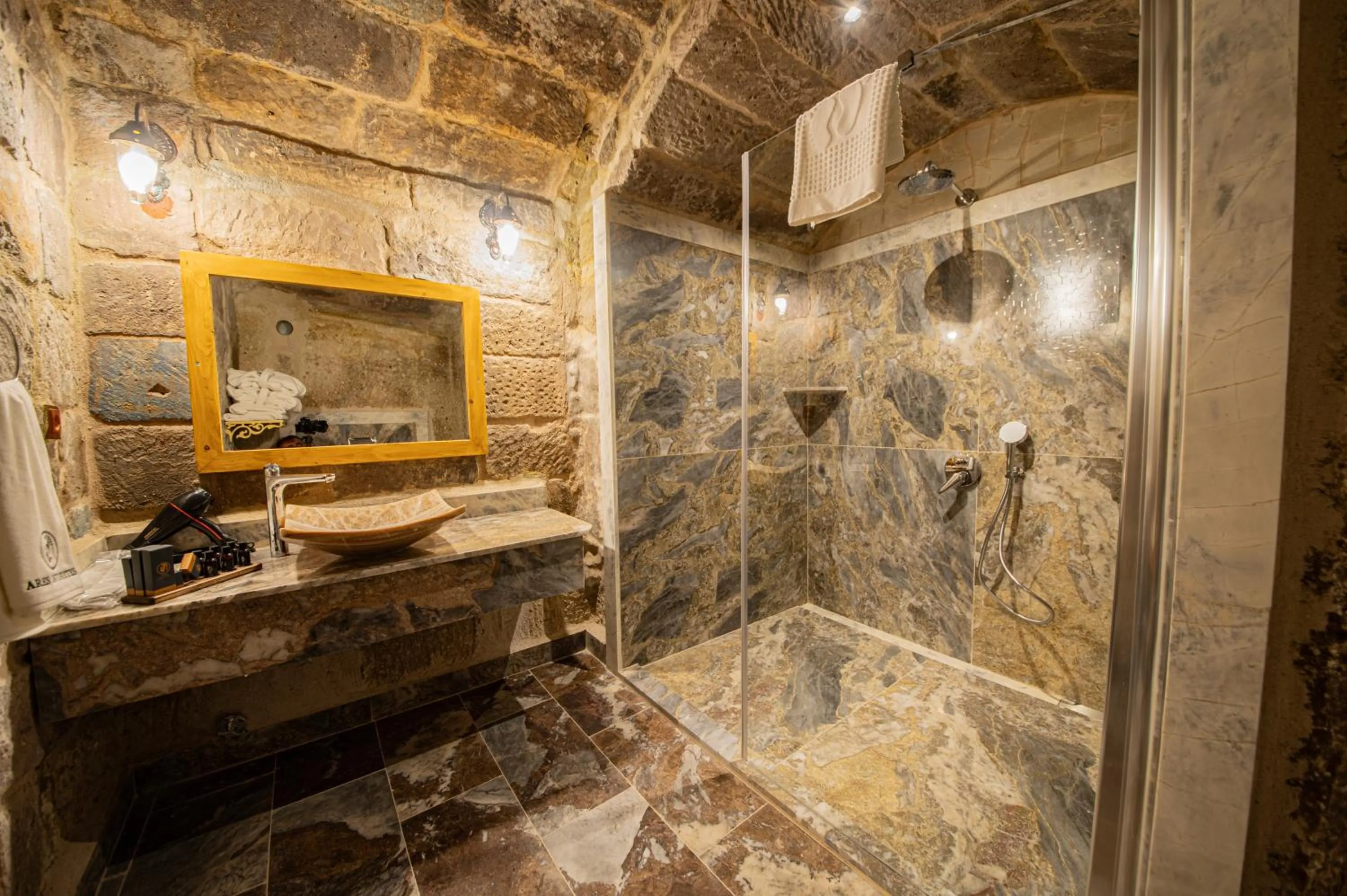 Bathroom in Ares Cave Suites