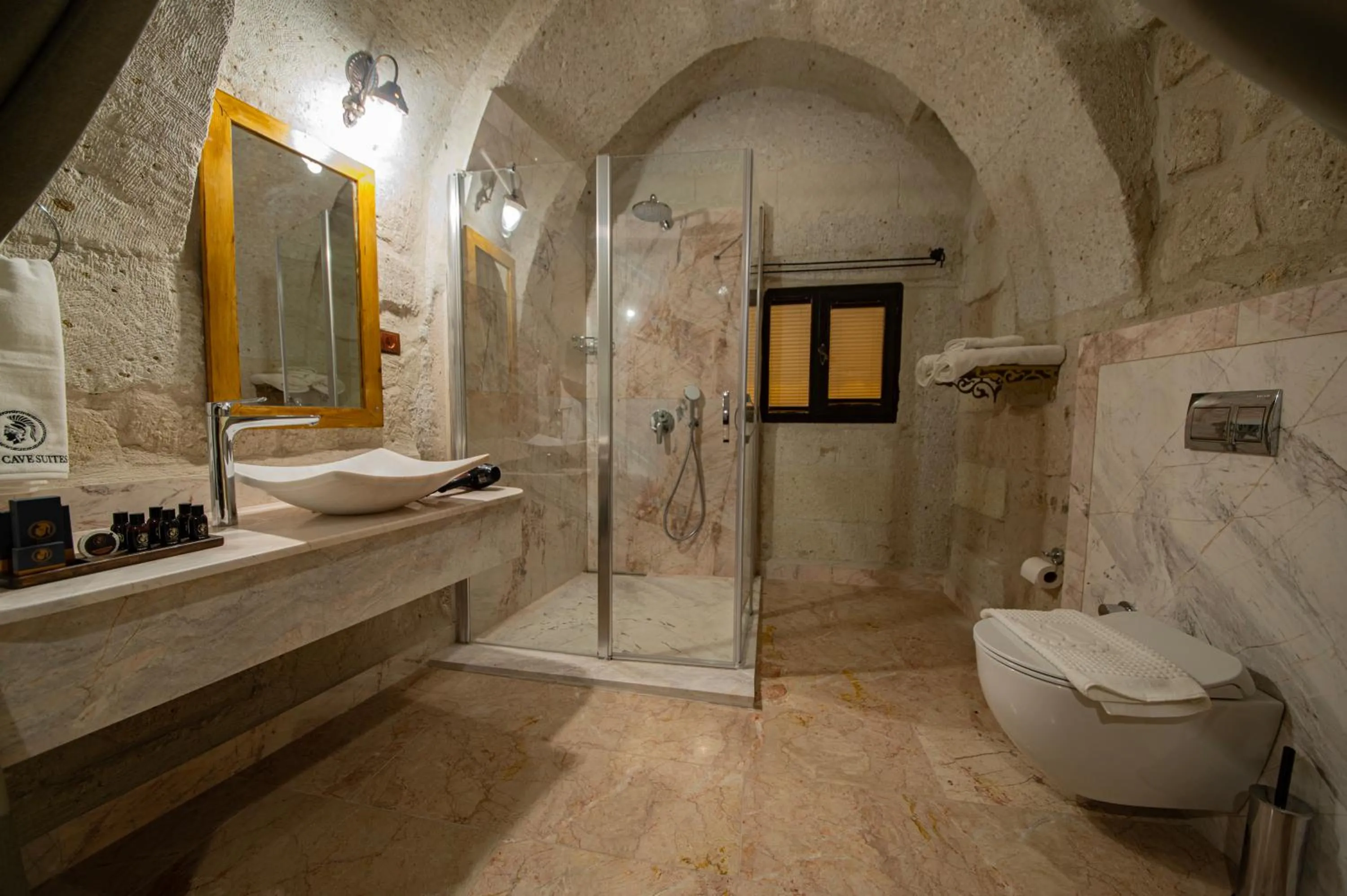 Toilet in Ares Cave Suites