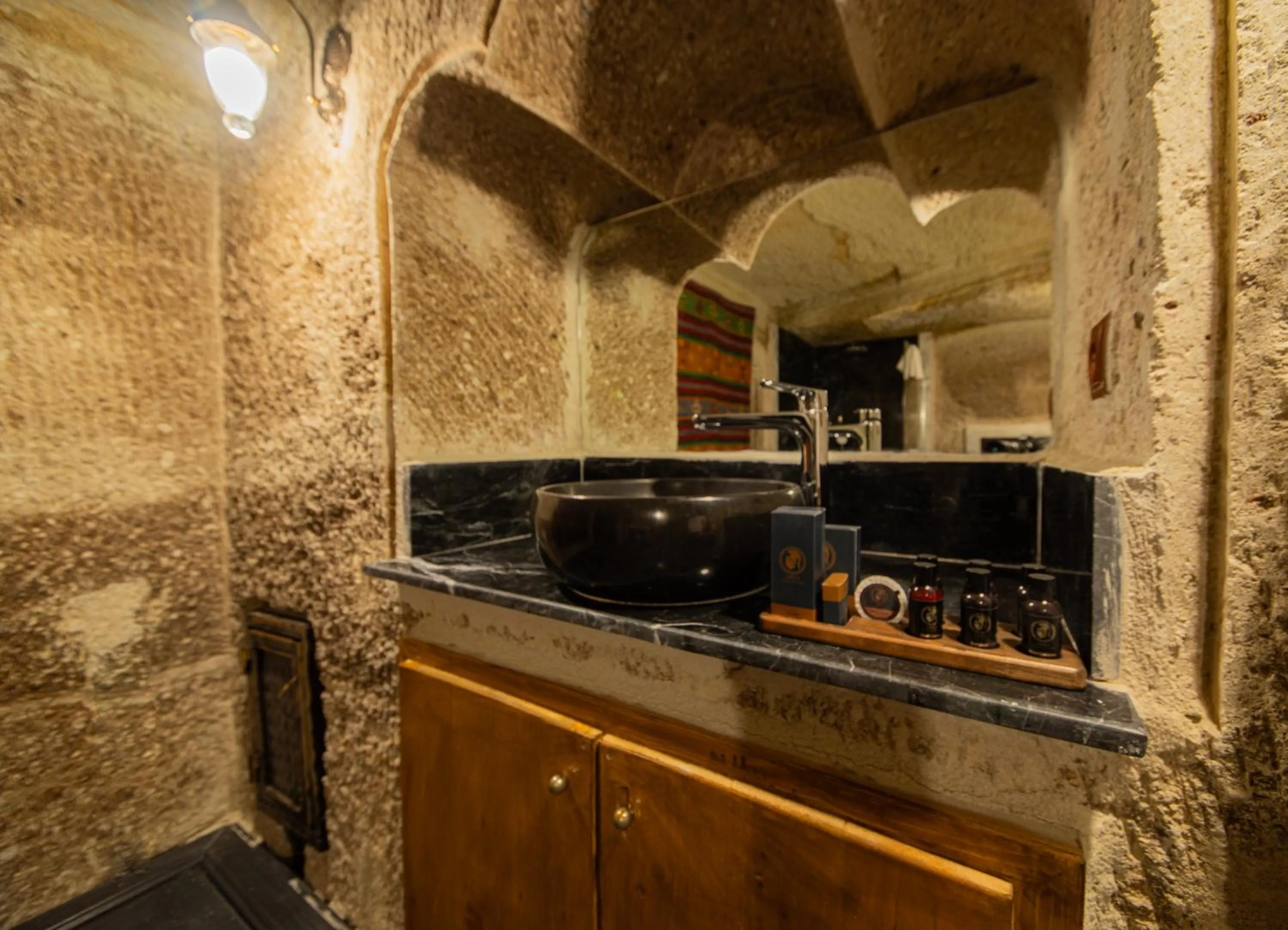 Bathroom in Ares Cave Suites