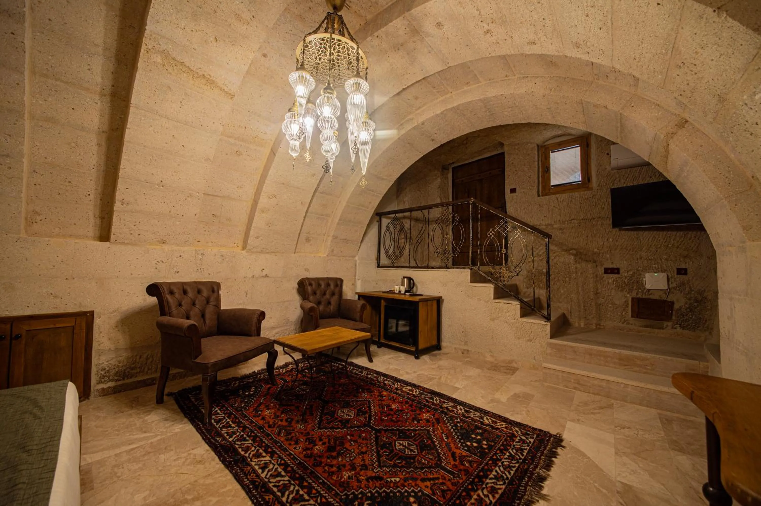 Seating area in Ares Cave Suites