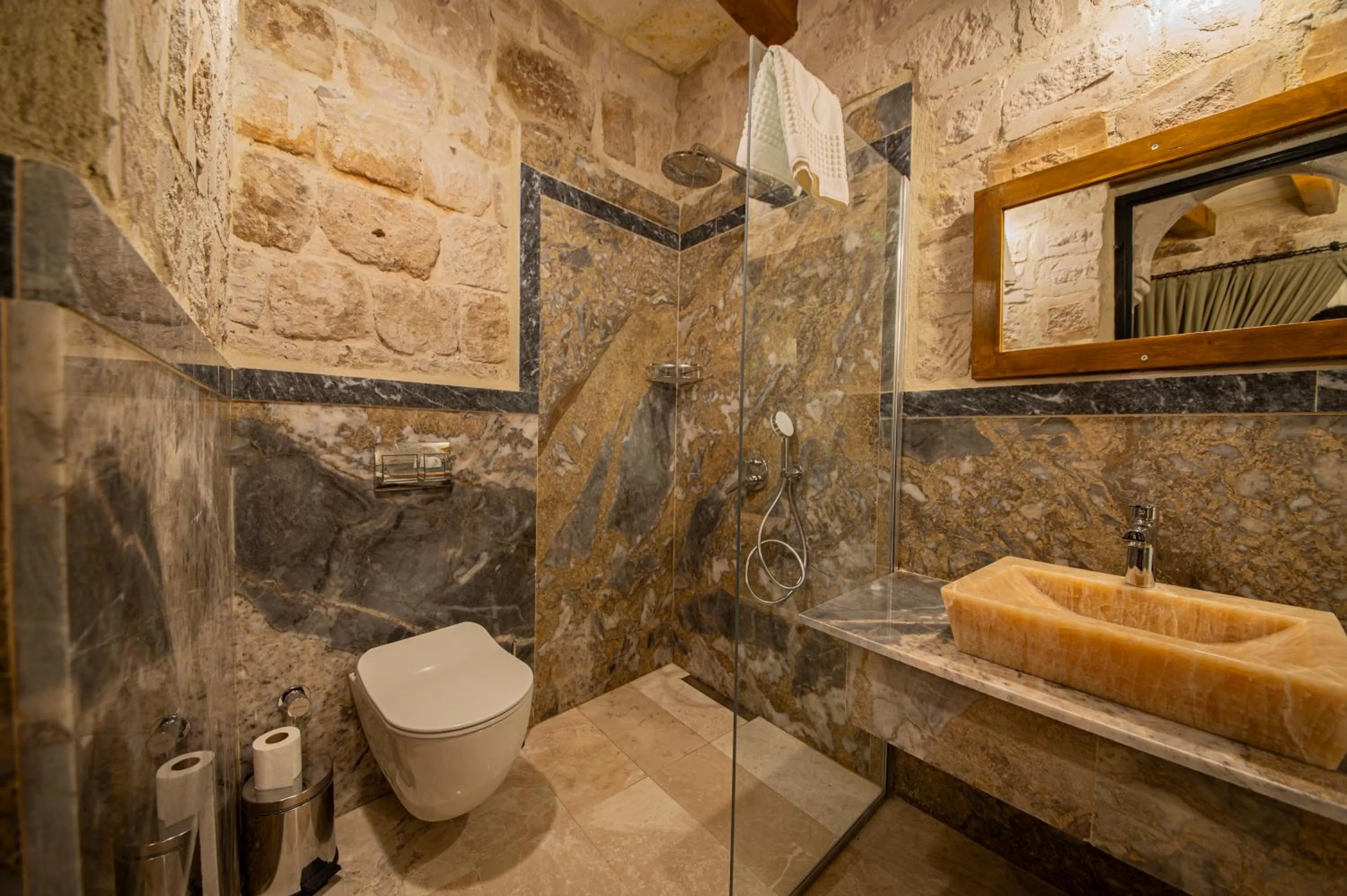 Bathroom in Ares Cave Suites