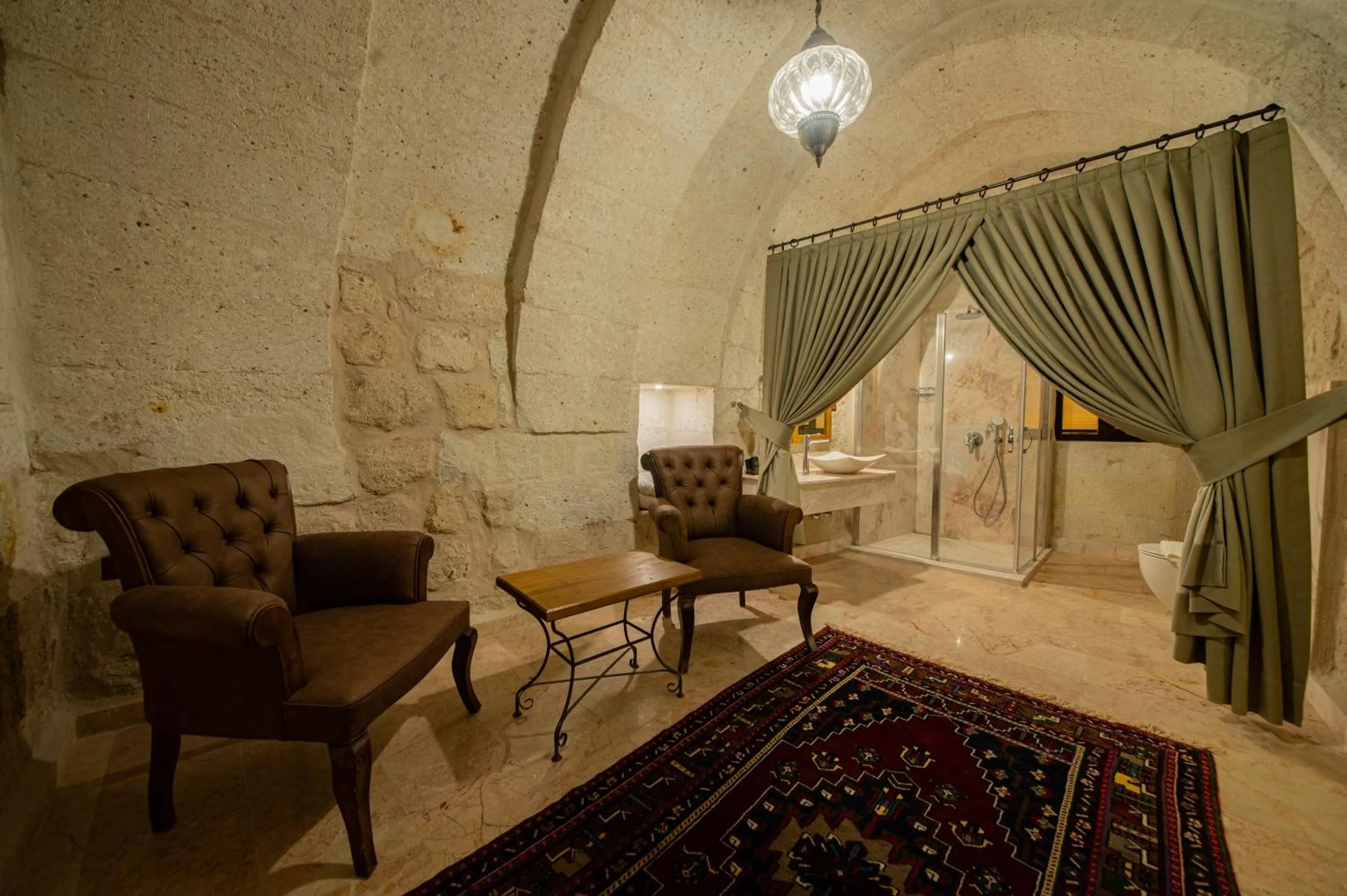 Living room in Ares Cave Suites