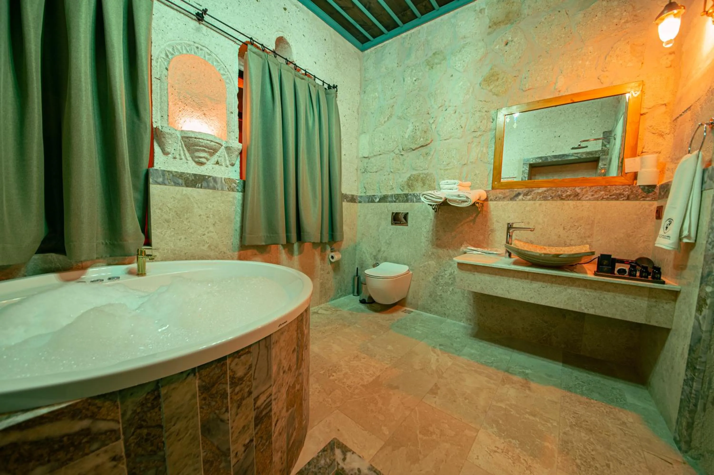 Bathroom in Ares Cave Suites
