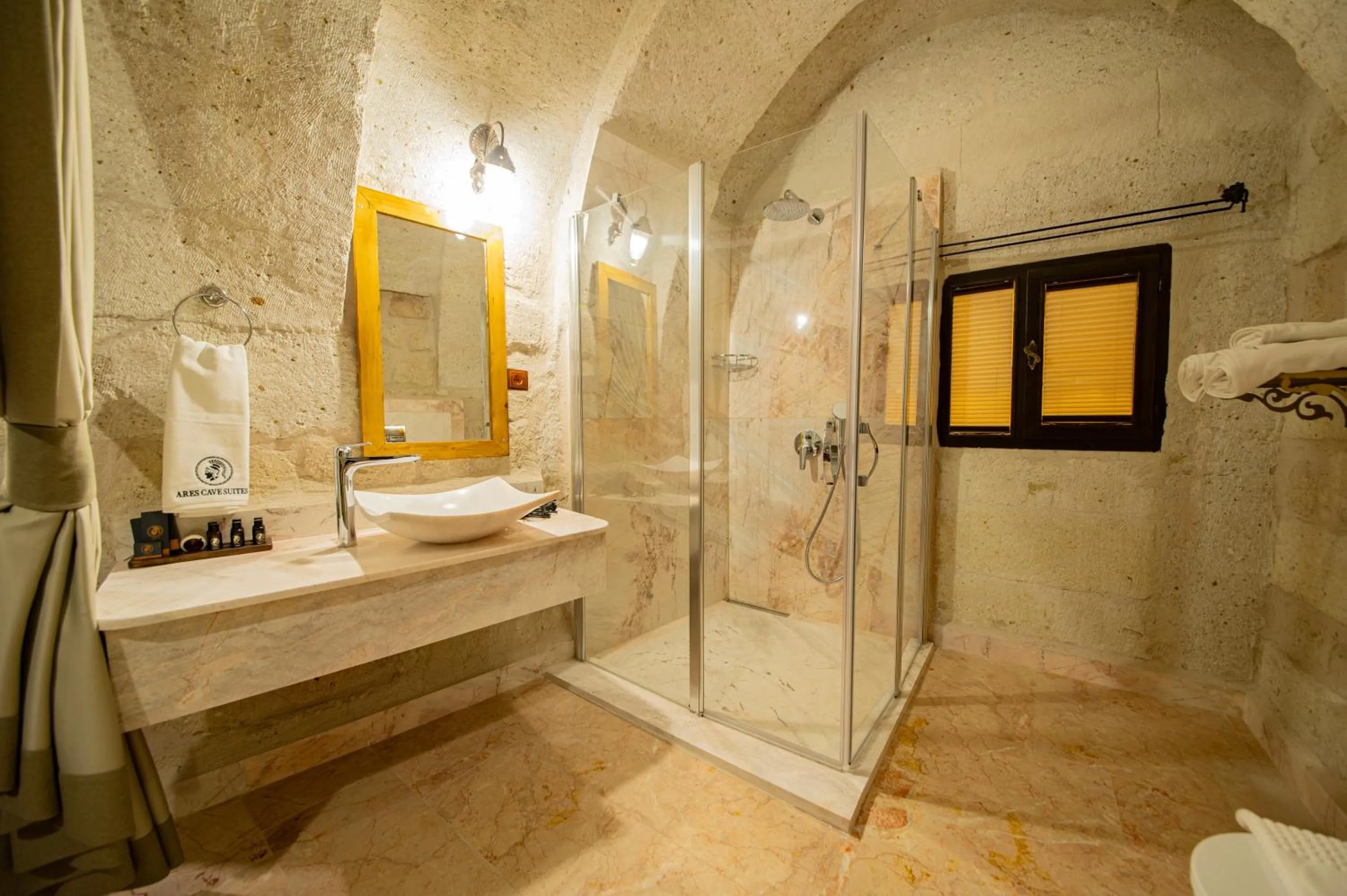 Bathroom in Ares Cave Suites