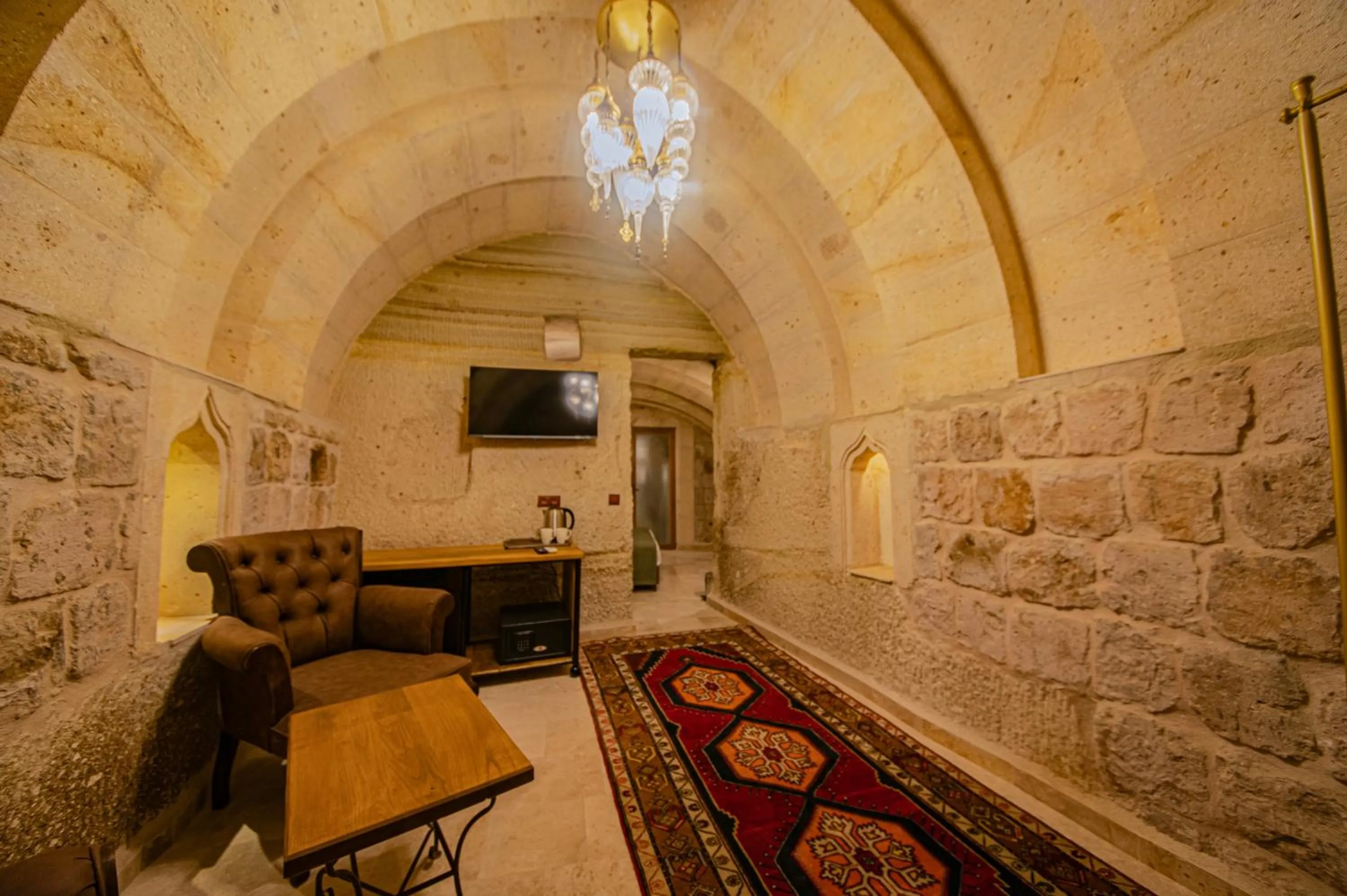 Seating area in Ares Cave Suites