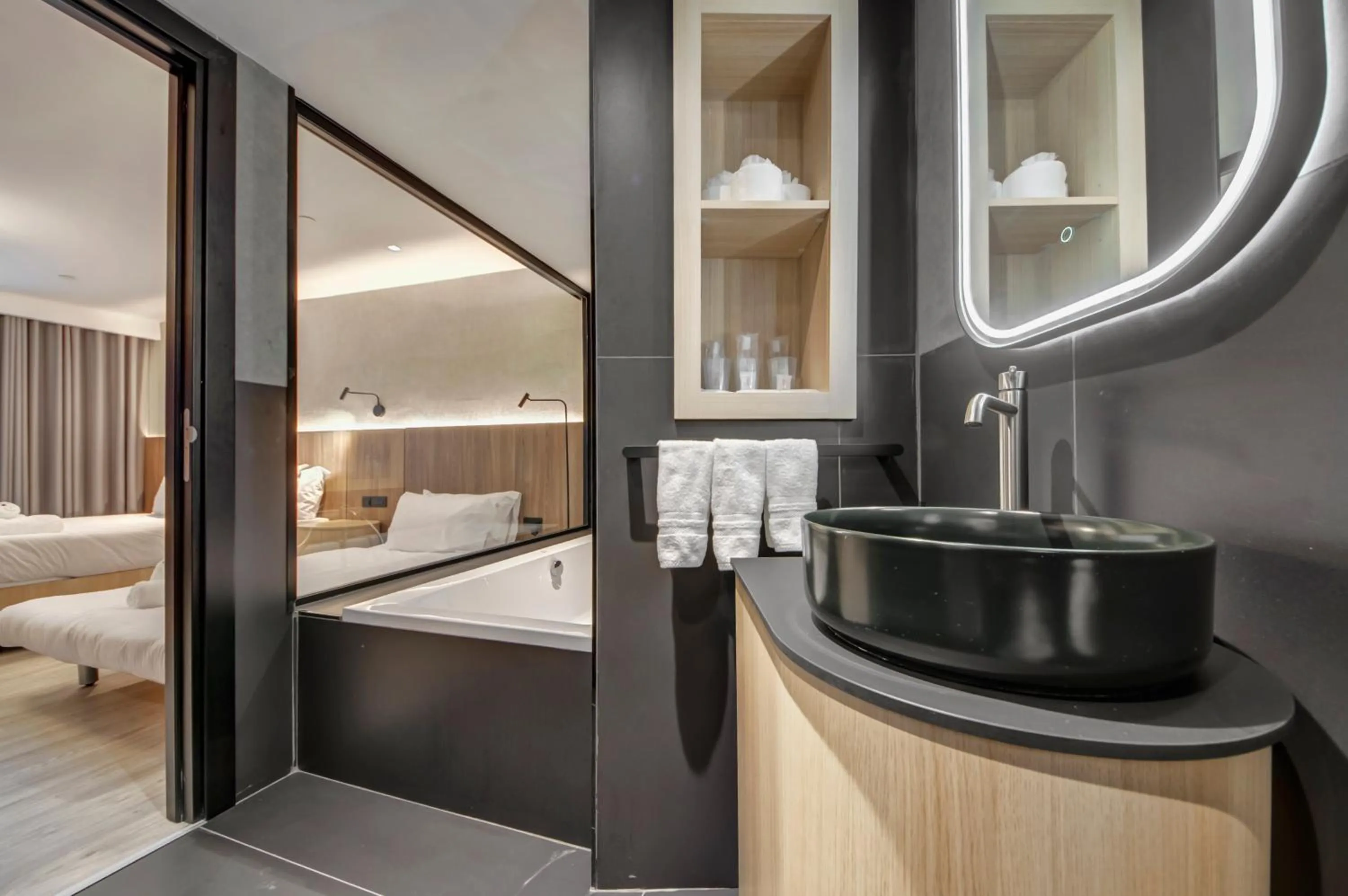 Bathroom, Bed in Noru Hotel Malta - Adults Only Hotel